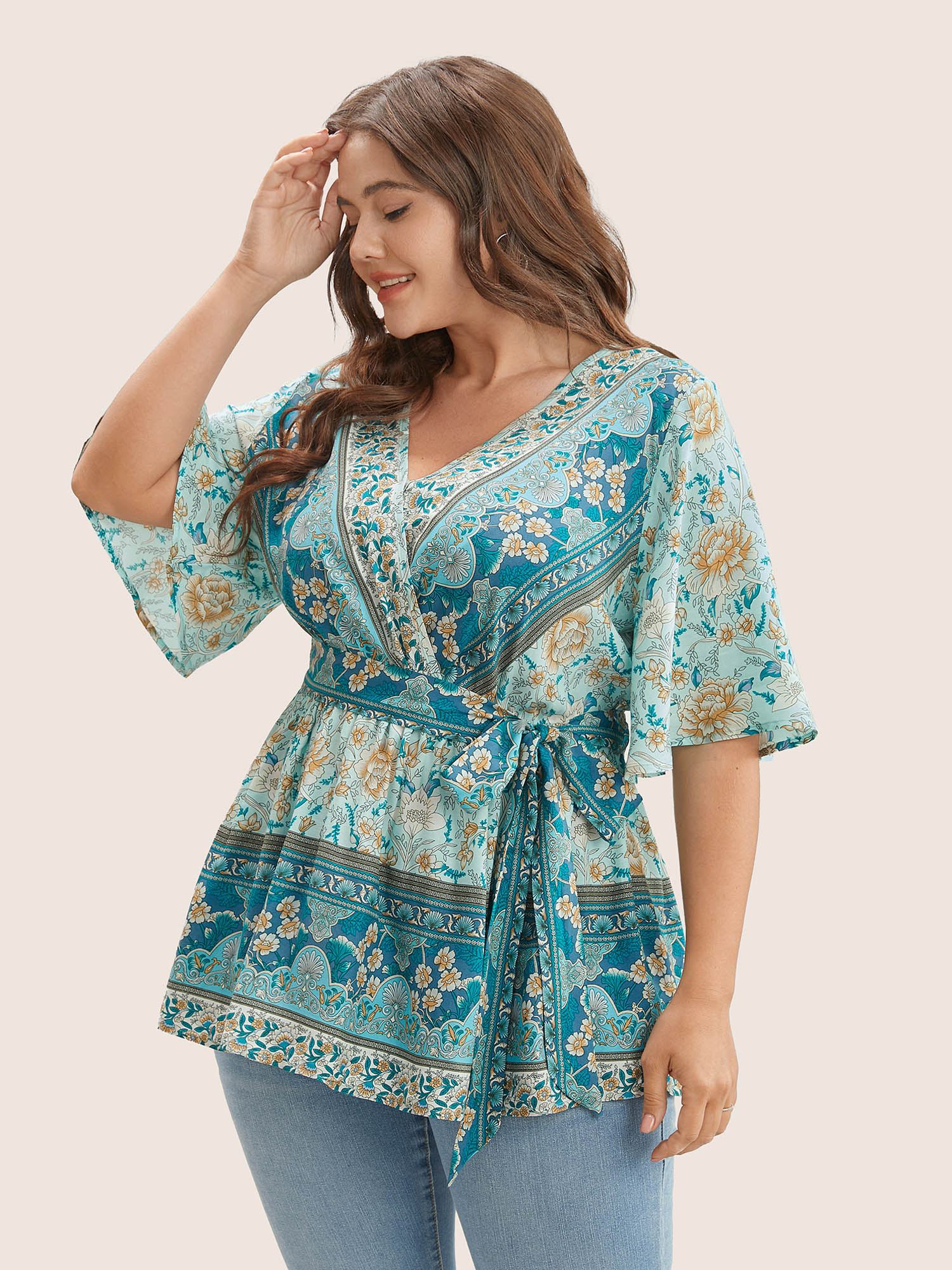 

Plus Size Turquoise Floral Print Ruffles Belted Wrap Blouse Women Resort Half Sleeve V-neck Vacation Blouses BloomChic