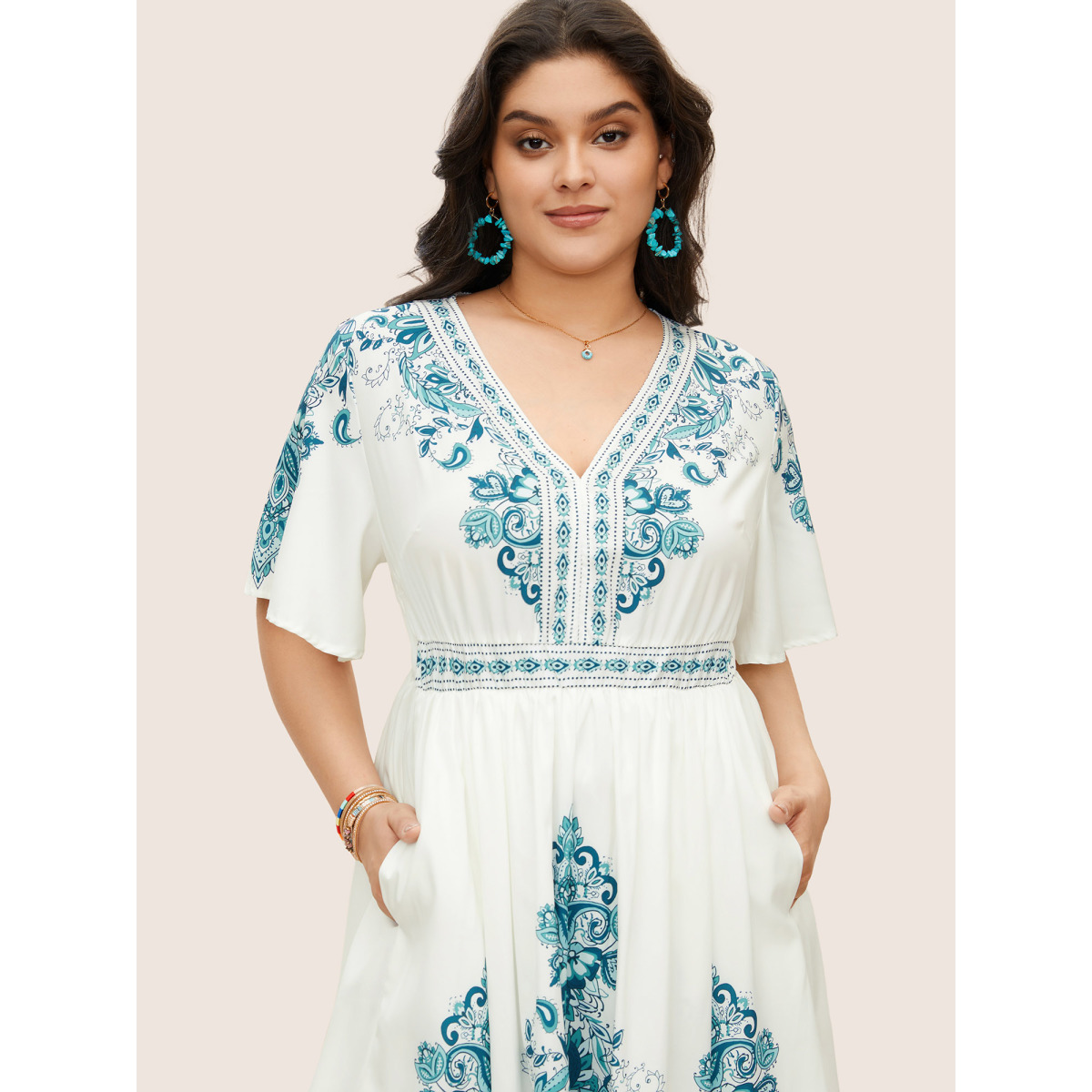 

Vintage Embroidered Floral Print Plus Size Vacation Dress Women Bohemian Emerald Pocket Ruffle Sleeve Short Sleeve V Neck Pocket Casual Knee Dress BloomChic