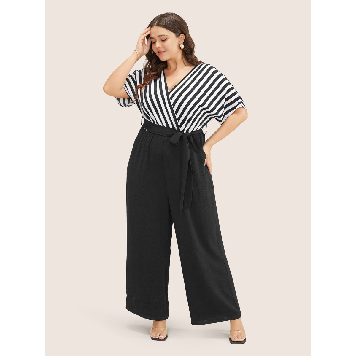 

Plus Size Black Striped Patchwork Pocket Batwing Sleeve Belted Wrap Jumpsuit Women At the Office Short sleeve Overlap Collar Work Loose Jumpsuits BloomChic
