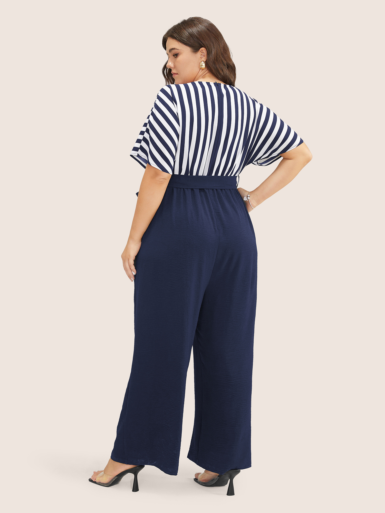 

Plus Size DarkBlue Striped Patchwork Pocket Batwing Sleeve Belted Wrap Jumpsuit Women At the Office Short sleeve Overlap Collar Work Loose Jumpsuits BloomChic