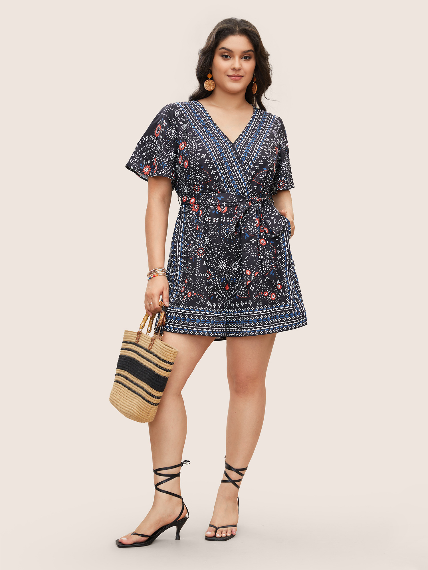 

Plus Size Black Bandana Print Belted Pocket Surplice Neck Romper Women Resort Short sleeve V-neck Vacation Loose Jumpsuits BloomChic