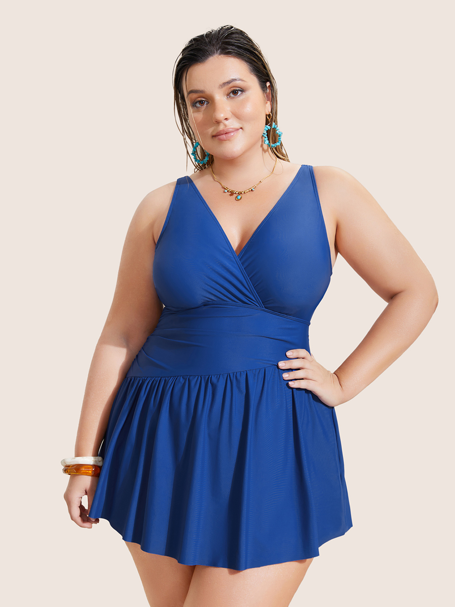 

Plus Size Solid Surplice Neck Gathered Swim Dress Women's Swimwear Indigo Beach Bodycon V-neck High stretch Curve Swim Dresses BloomChic