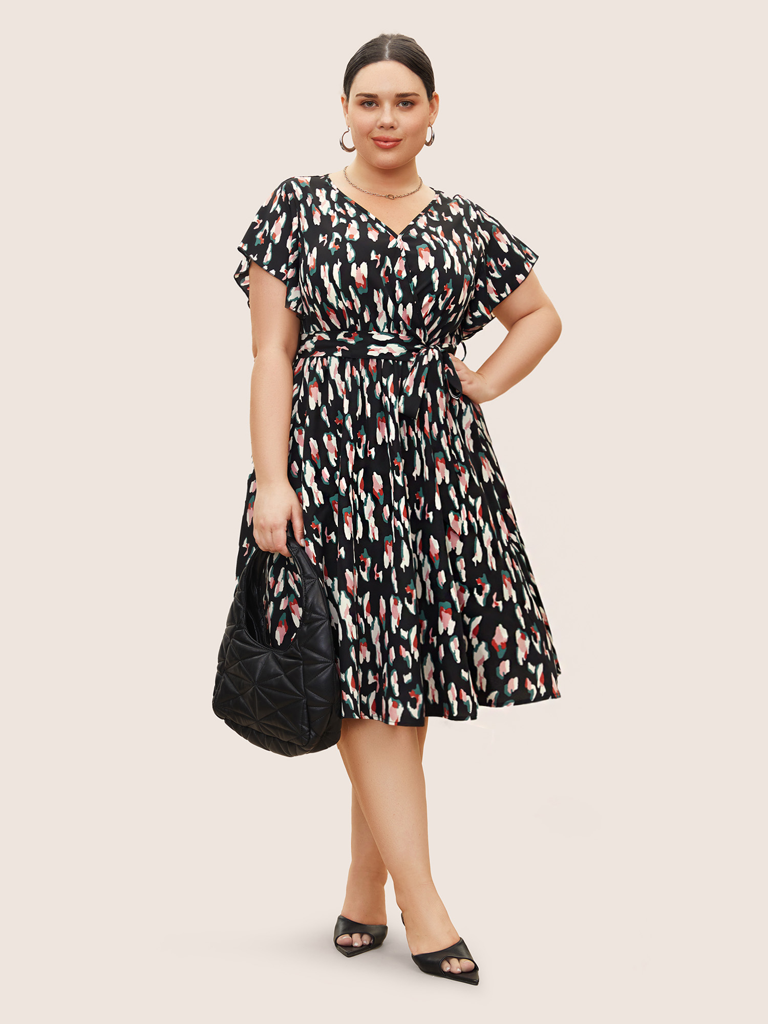 

Plus Size Allover Print Surplice Neck Flutter Sleeve Dress Black Women At the Office Overlapping V-neck Short sleeve Curvy BloomChic