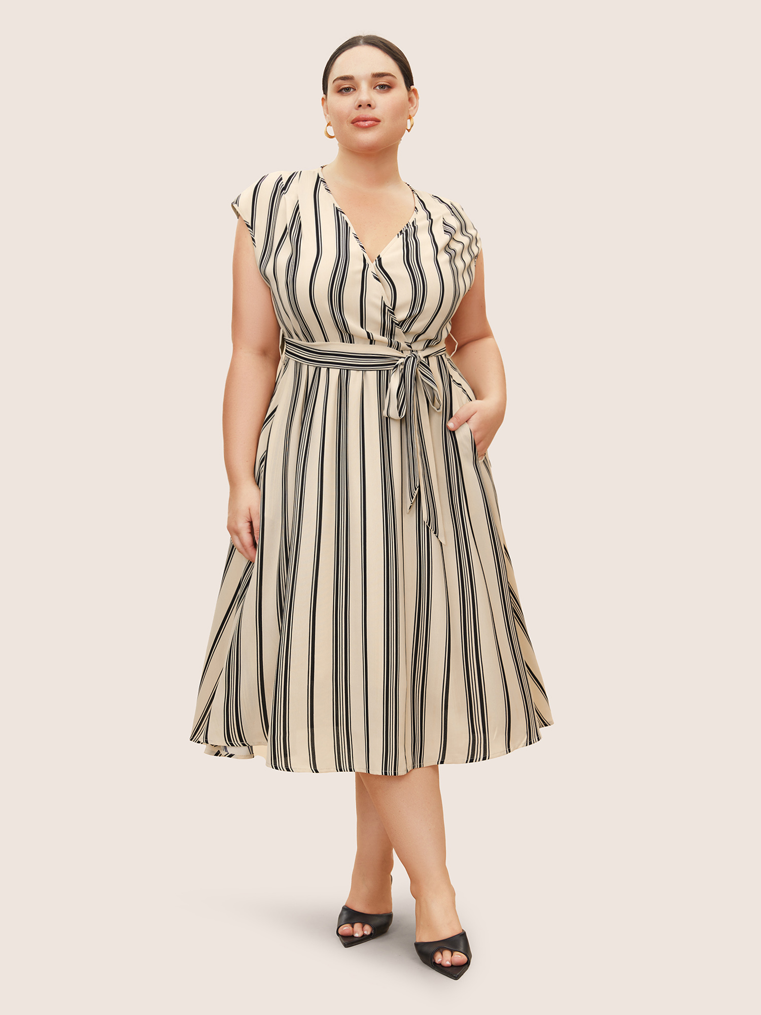 

Plus Size Surplice Neck Striped Cap Sleeve Dress Beige Women At the Office Overlapping V-neck Sleeveless Curvy BloomChic