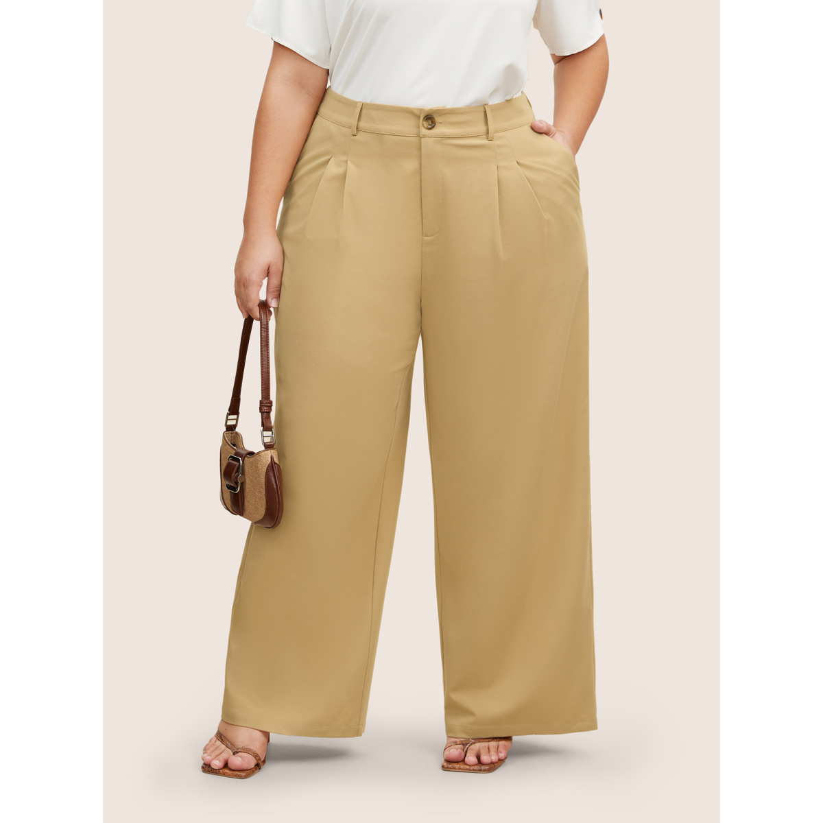 

Plus Size Solid Pleated Slanted Pocket Wide Leg Pants Women Champagne At the Office Wide Leg High Rise Work Pants BloomChic