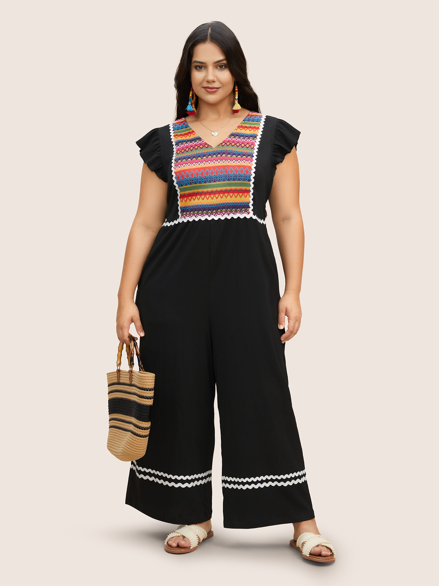 

Plus Size Black Contrast Webbing Ruffle Cap Sleeve Jumpsuit Women Resort Cap Sleeve V-neck Vacation Loose Jumpsuits BloomChic