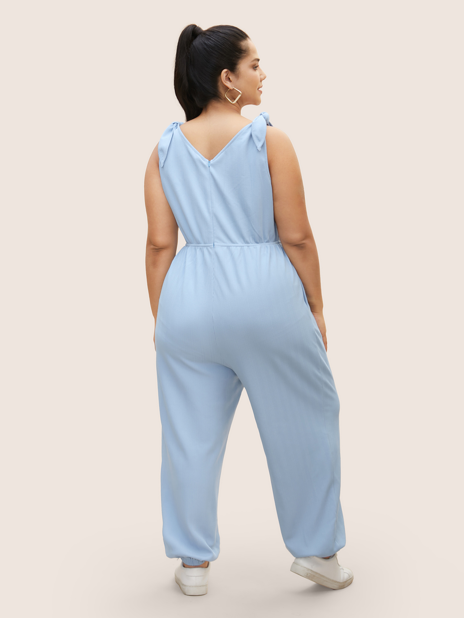 

Plus Size LightBlue Solid Tie Knot Pit Strip Jumpsuit Women Casual Sleeveless V-neck Everyday Loose Jumpsuits BloomChic