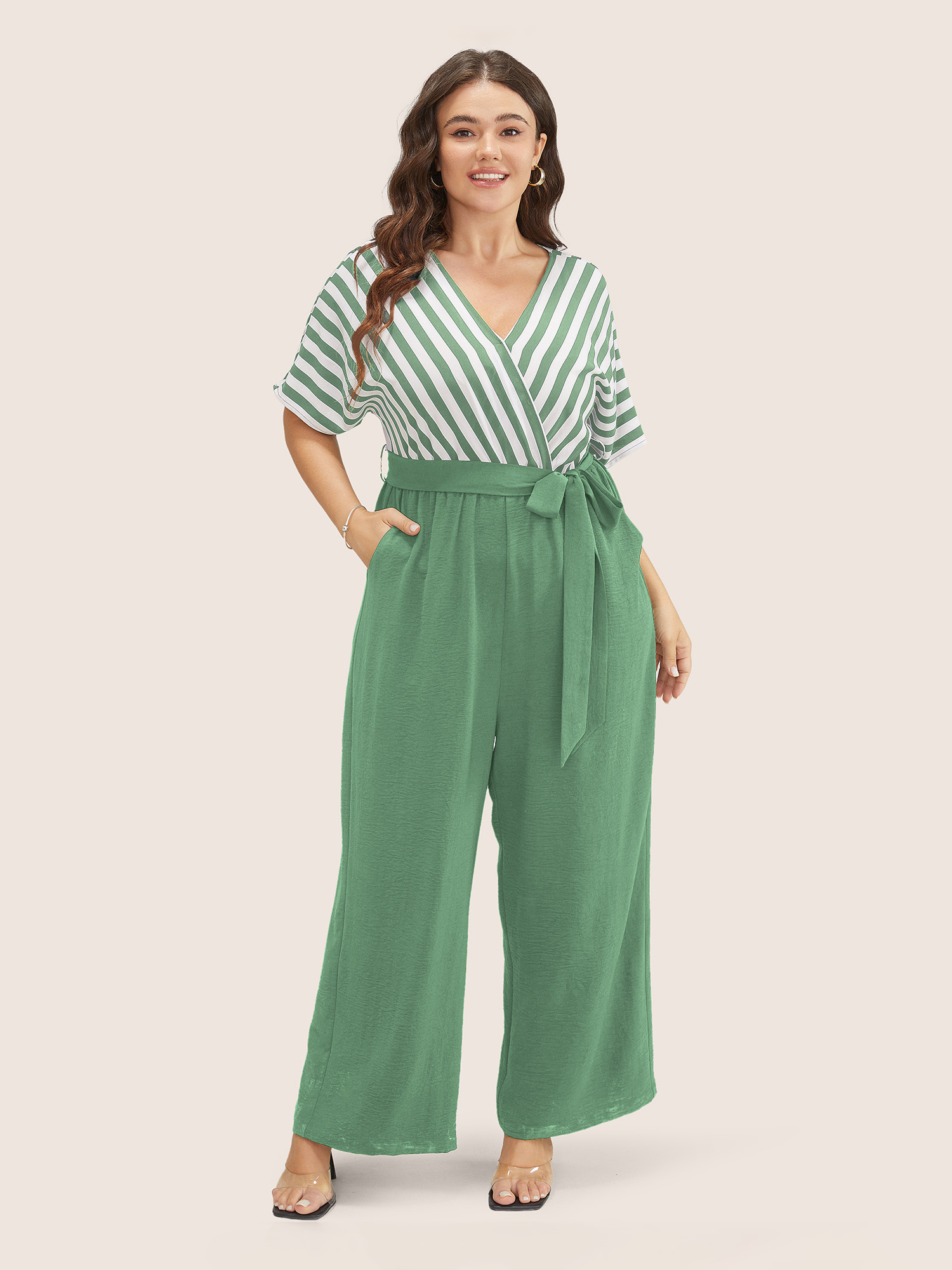 

Plus Size Palemauve Striped Patchwork Pocket Batwing Sleeve Belted Wrap Jumpsuit Women At the Office Short sleeve Overlap Collar Work Loose Jumpsuits BloomChic