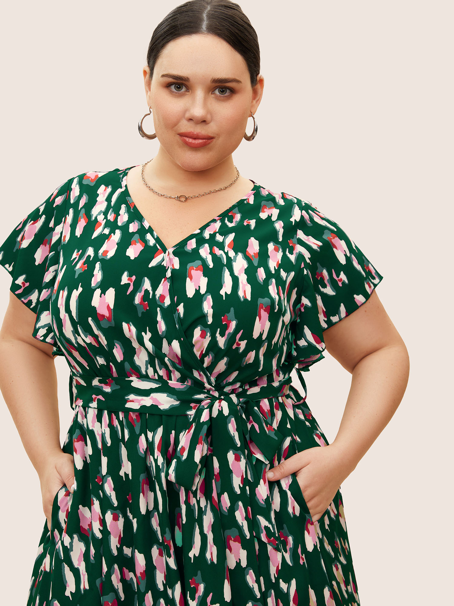 

Plus Size Allover Print Surplice Neck Flutter Sleeve Dress Emerald Women At the Office Overlapping V-neck Short sleeve Curvy BloomChic