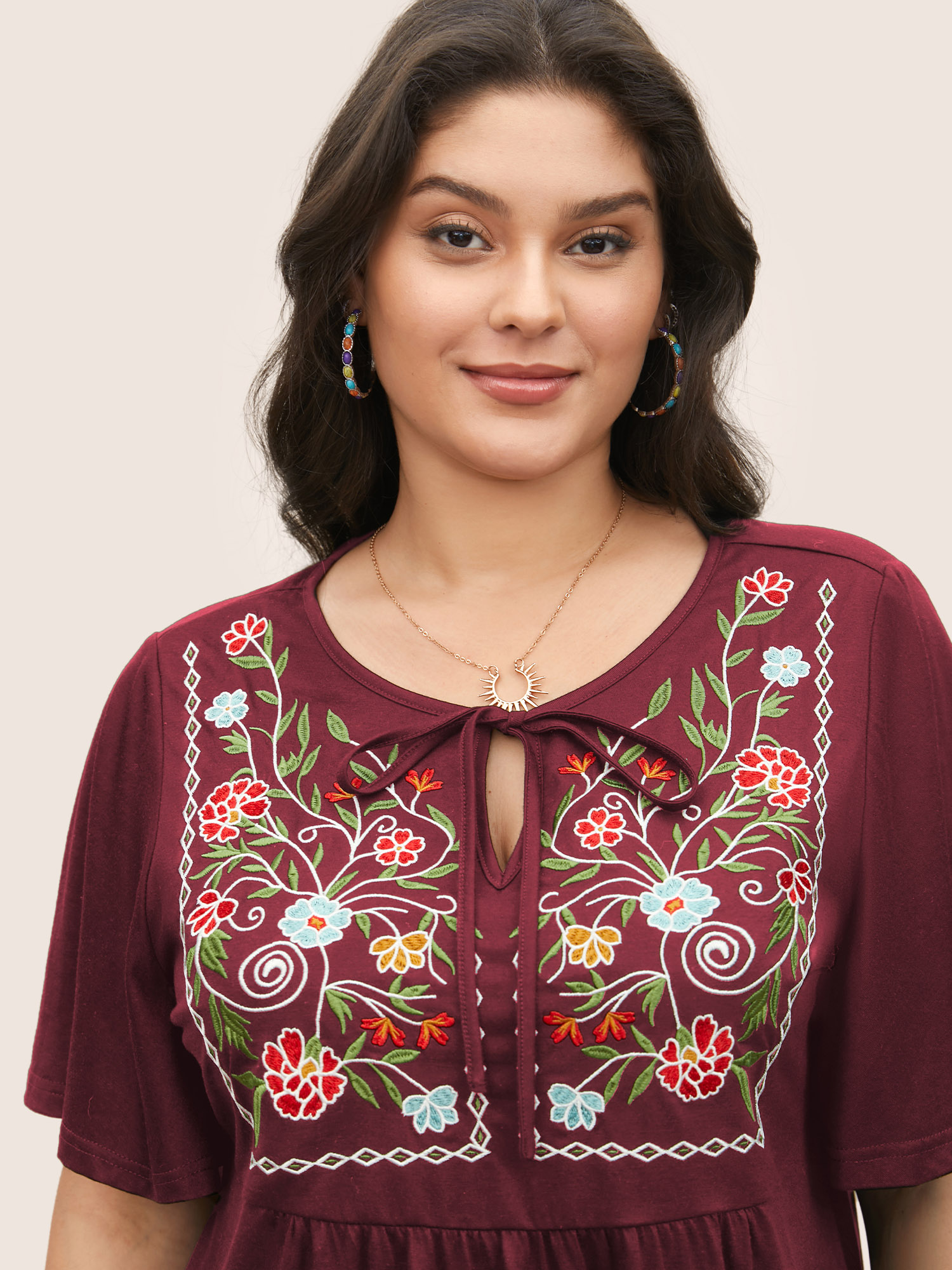 

Plus Size Floral Embroidered Tie Knot Gathered T-shirt Burgundy Women Resort Tie knot Heart neckline Vacation T-shirts BloomChic