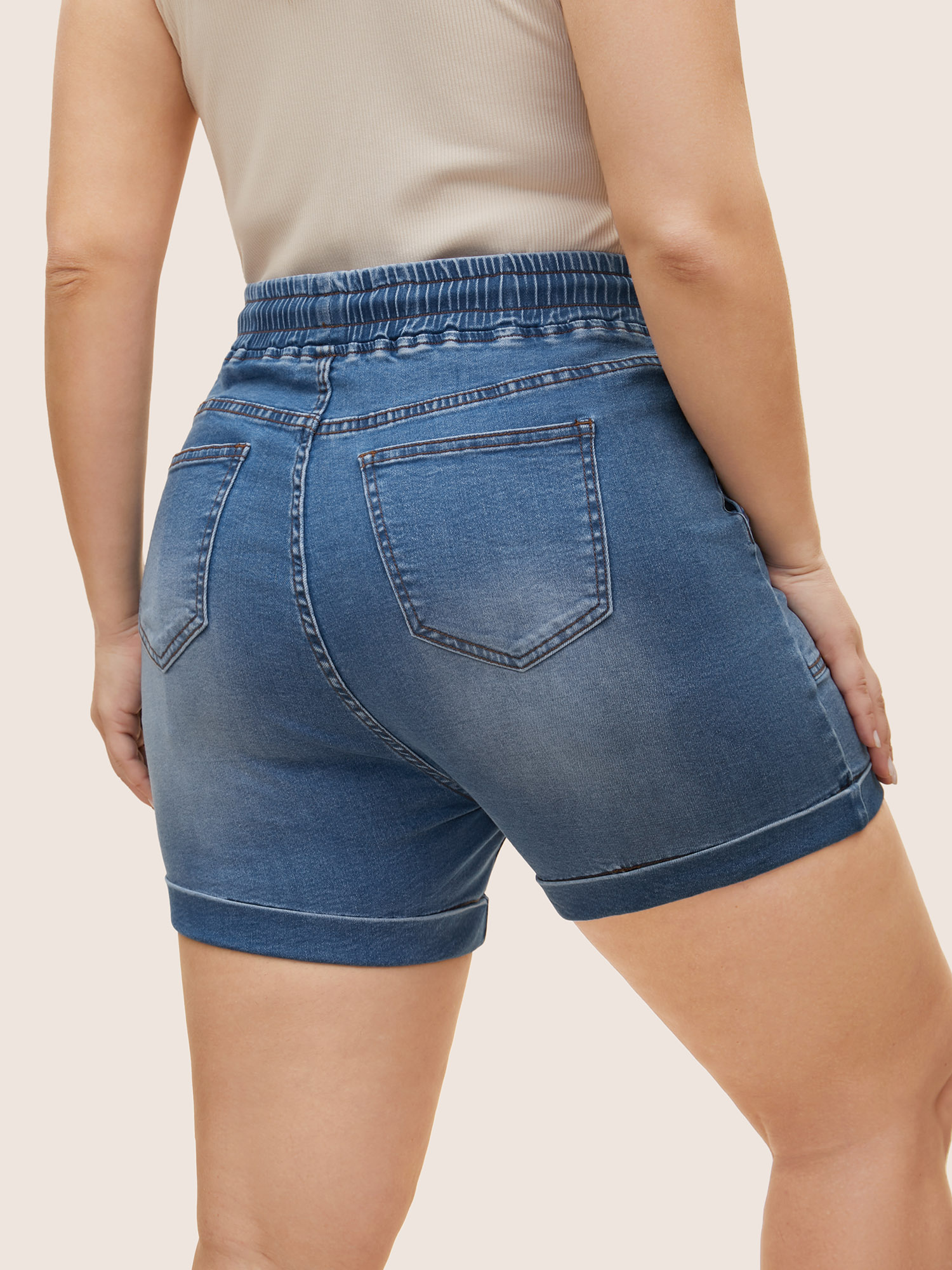 

Plus Size Medium Wash Drawstring Roll Hem Denim Shorts Women Midblue Roll Hem High stretch Everyday Slanted pocket Casual Denim Shorts BloomChic