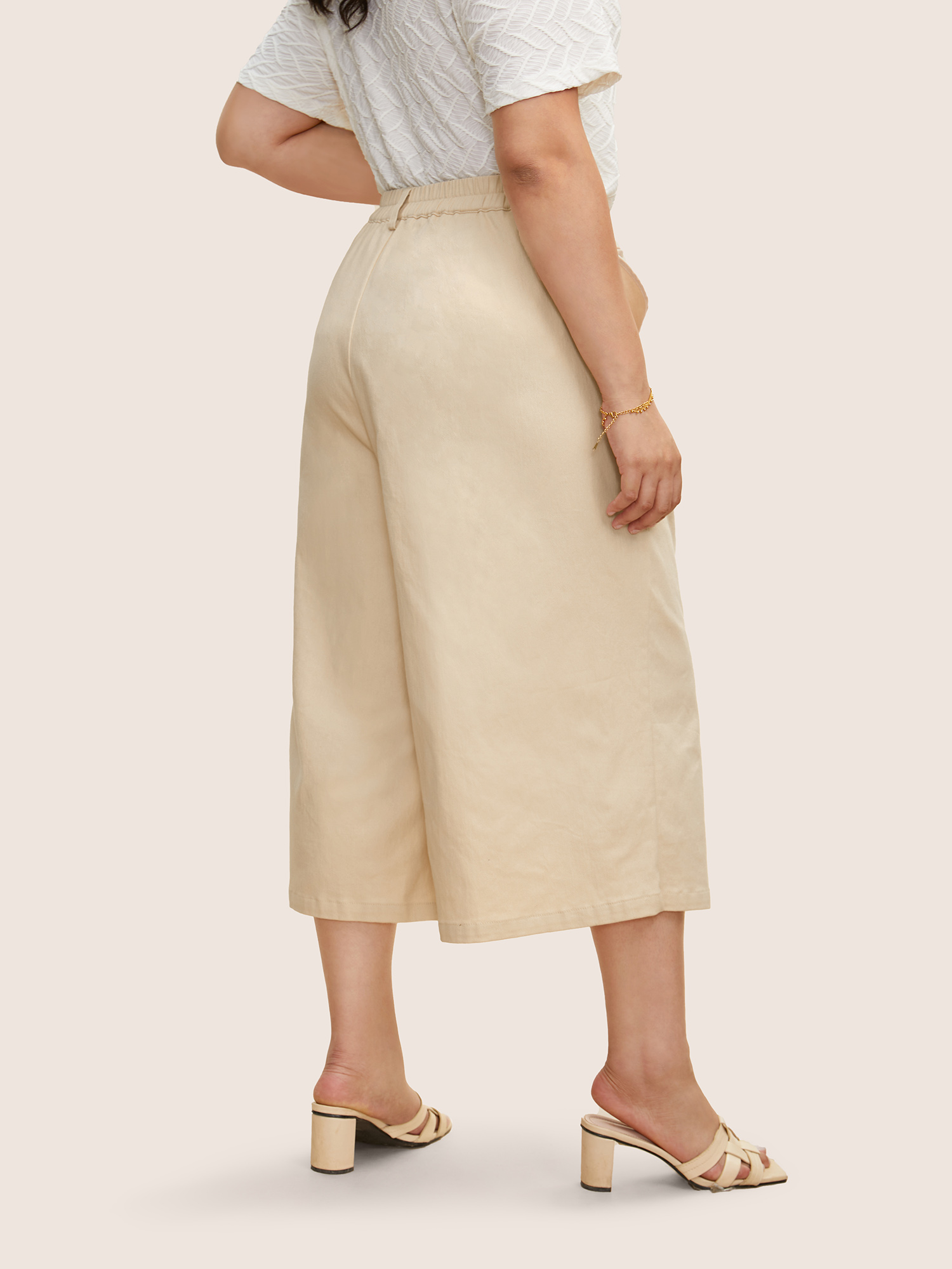 Plus Size Mid Rise Button Up Elastic Waist Loose Pants Women Beige Elegant Loose Mid Rise Everyday Pants BloomChic 10/M 