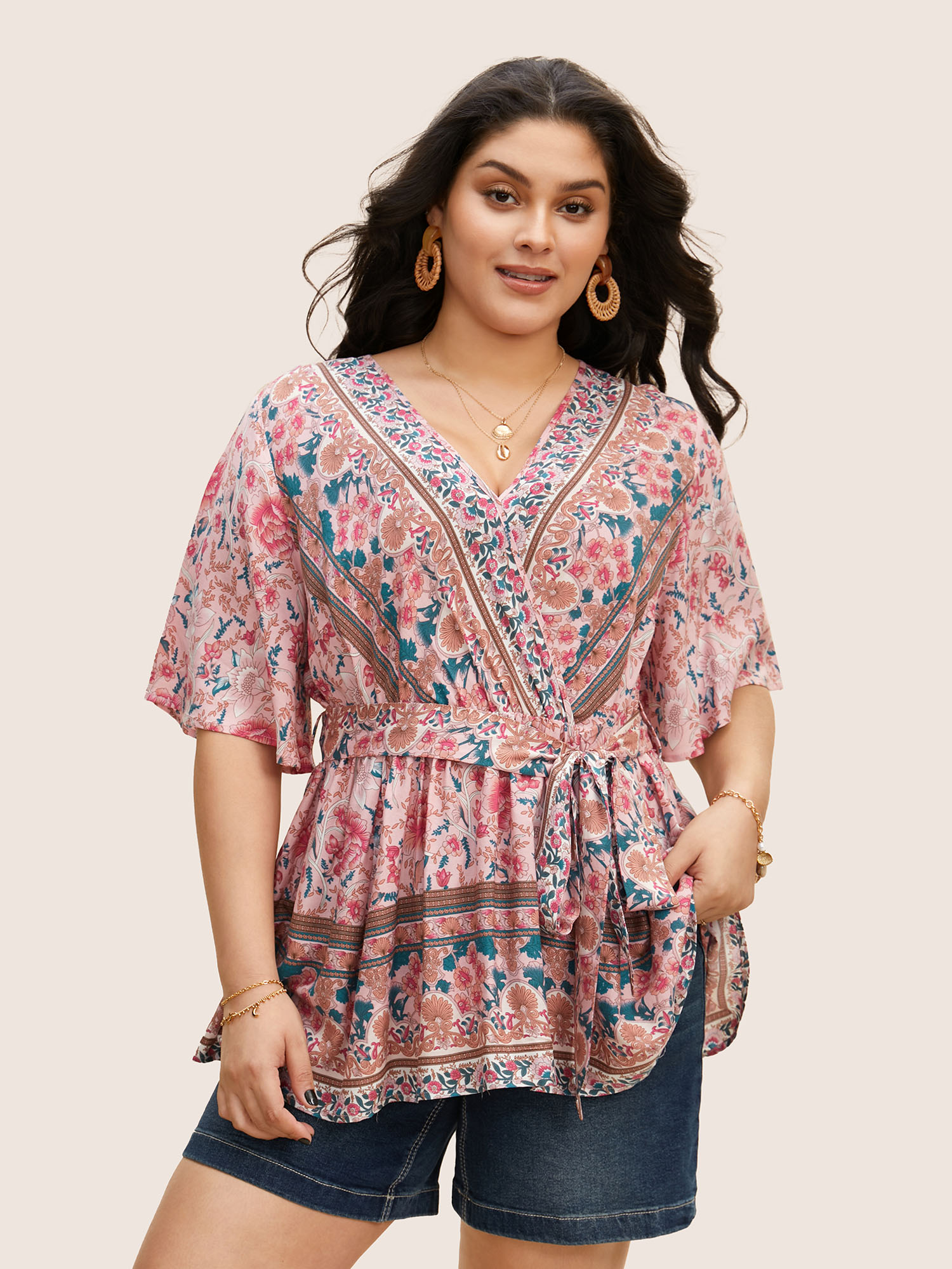 

Plus Size Blush Floral Print Ruffles Belted Wrap Blouse Women Resort Half Sleeve V-neck Vacation Blouses BloomChic