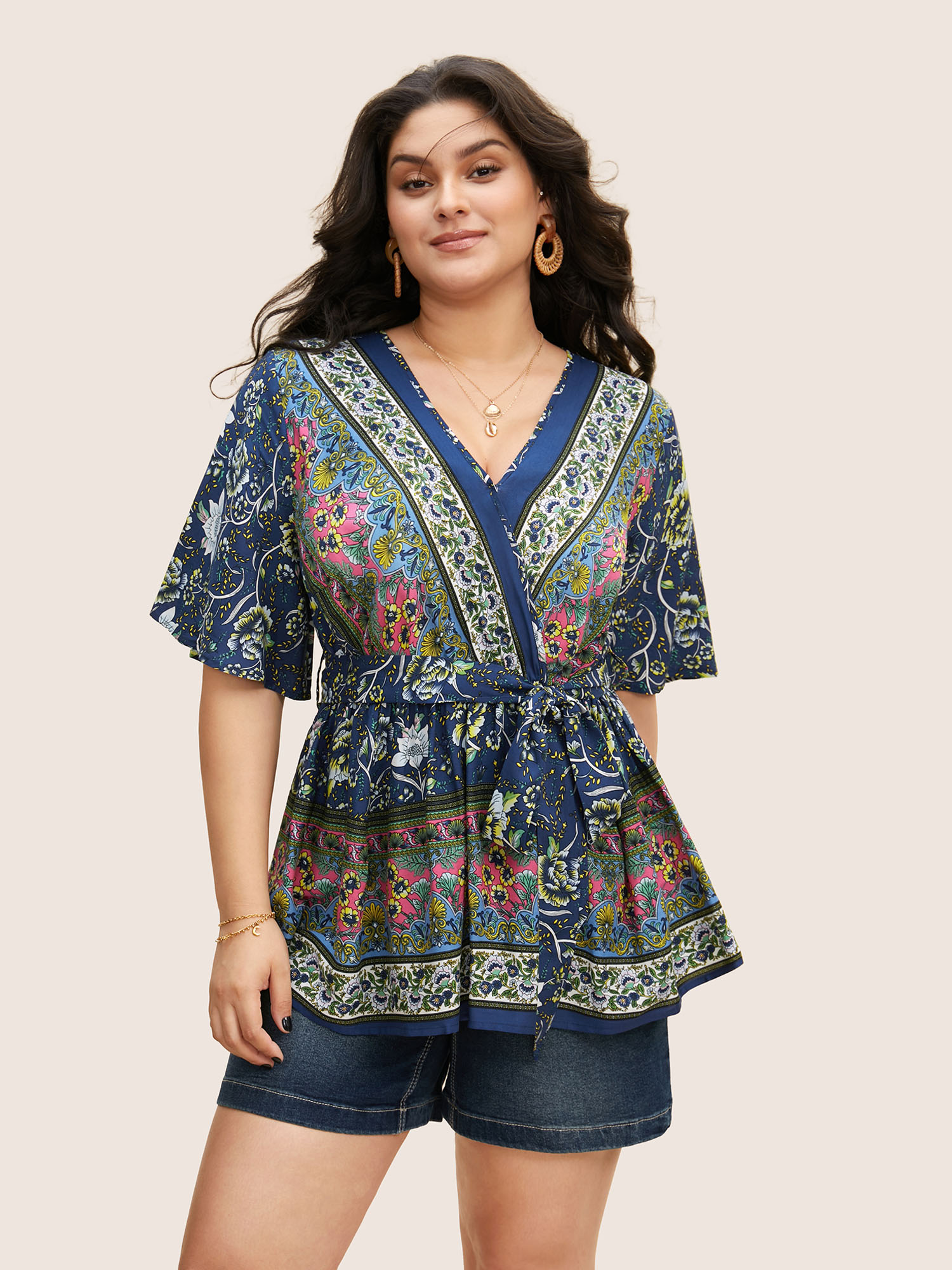 

Plus Size Indigo Floral Print Ruffles Belted Wrap Blouse Women Resort Half Sleeve V-neck Vacation Blouses BloomChic