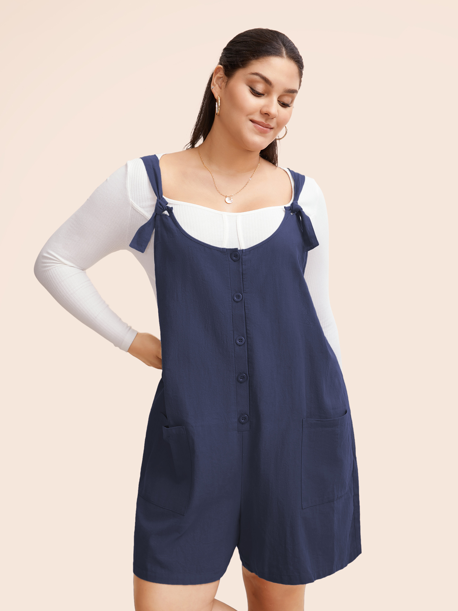 

Plus Size Navy Solid Pocket Button Detail Knot Shoulder Overall Romper Women Casual Sleeveless Tie Neck Dailywear Loose Jumpsuits BloomChic