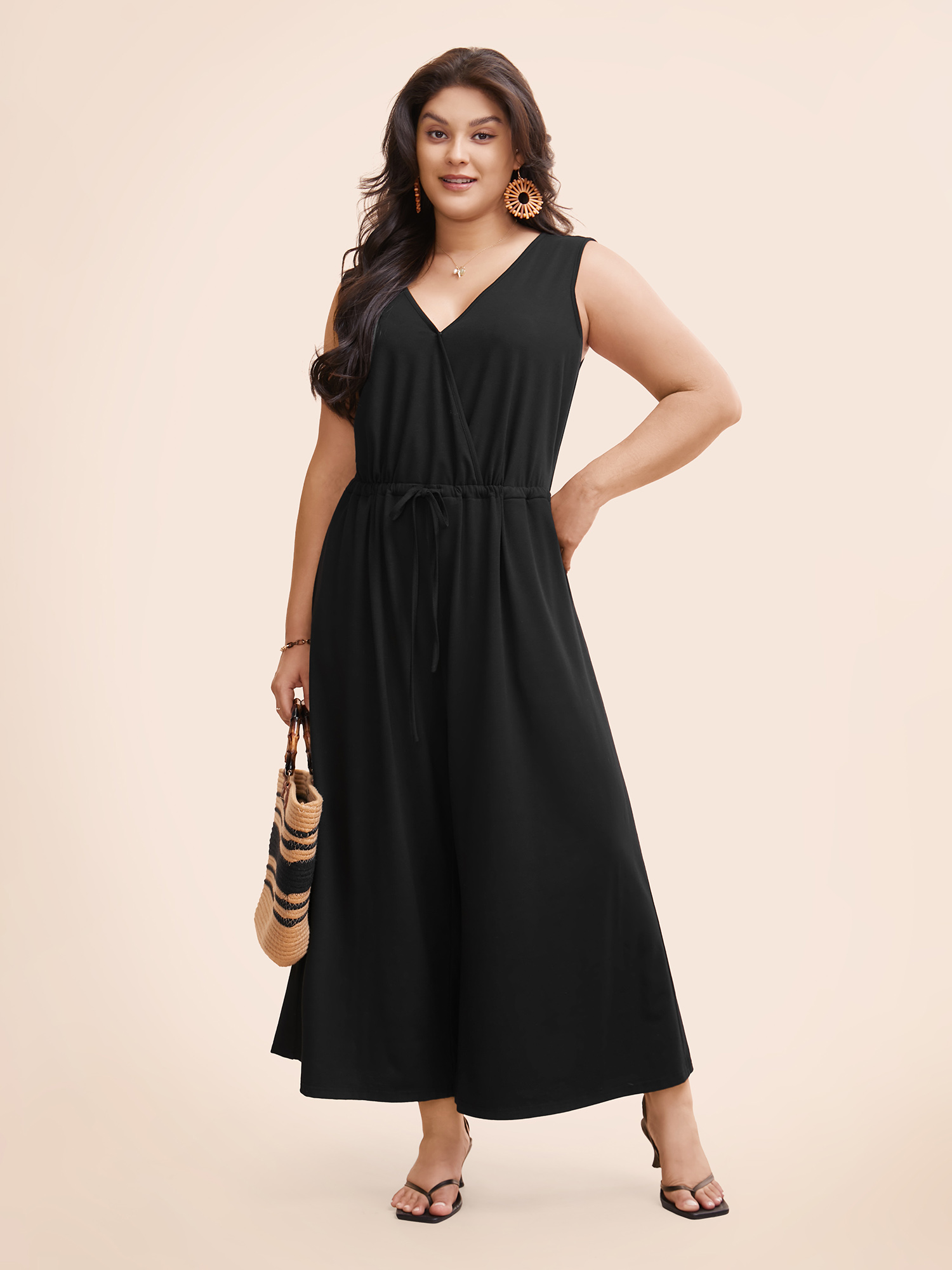 Plus Size Black Solid Overlap Collar Drawstring Jumpsuit Women Elegant Sleeveless Overlap Collar Everyday Loose Jumpsuits BloomChic 30/6X 