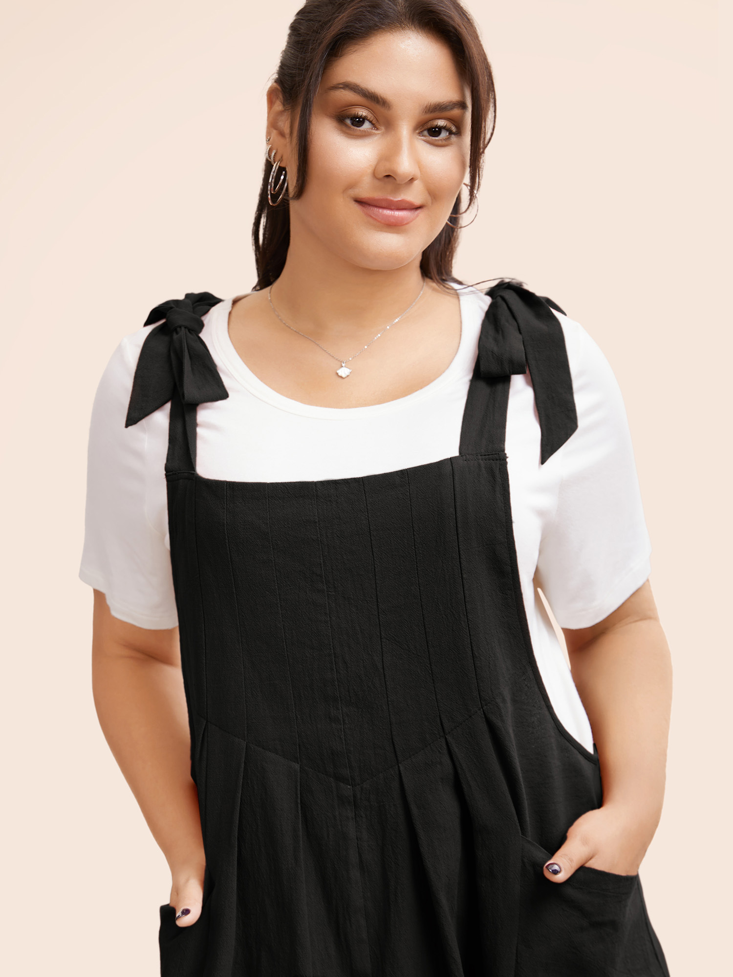 

Plus Size Solid Pleated Hem Pocket Tie Shoulder Overall Dress Black Women Casual Pleated Spaghetti Strap Sleeveless Curvy Knee Dress BloomChic