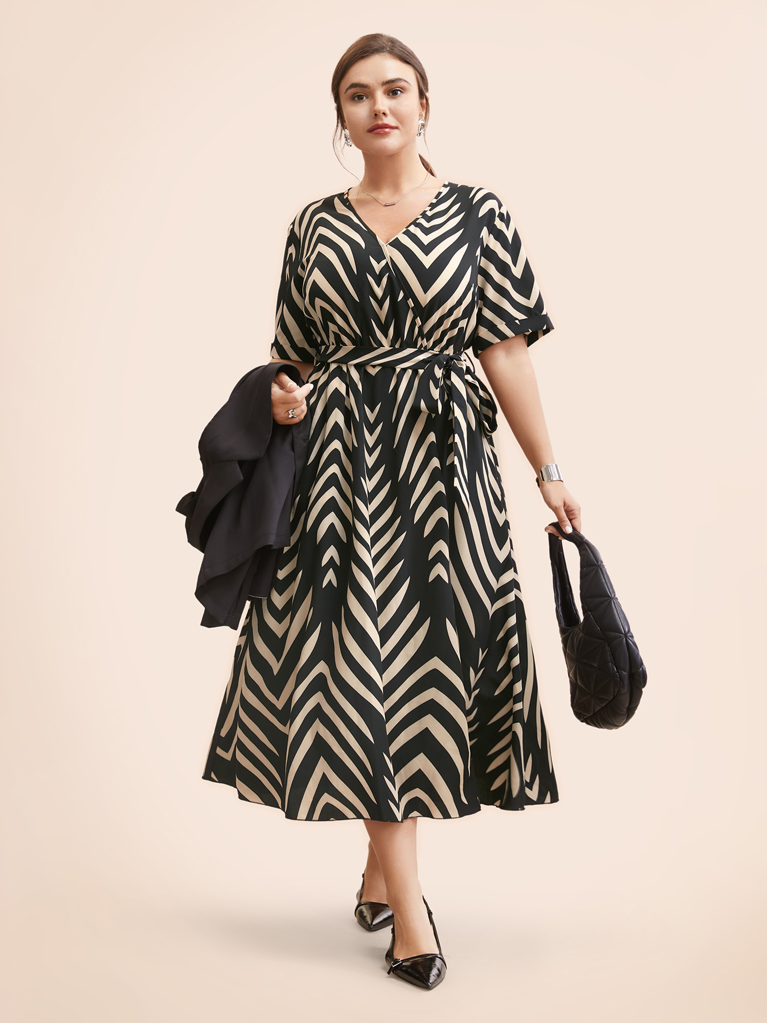 

Plus Size Geometric Striped Overlap Collar Midi Dress Black Women At the Office Belted Overlap Collar Half Sleeve Curvy BloomChic