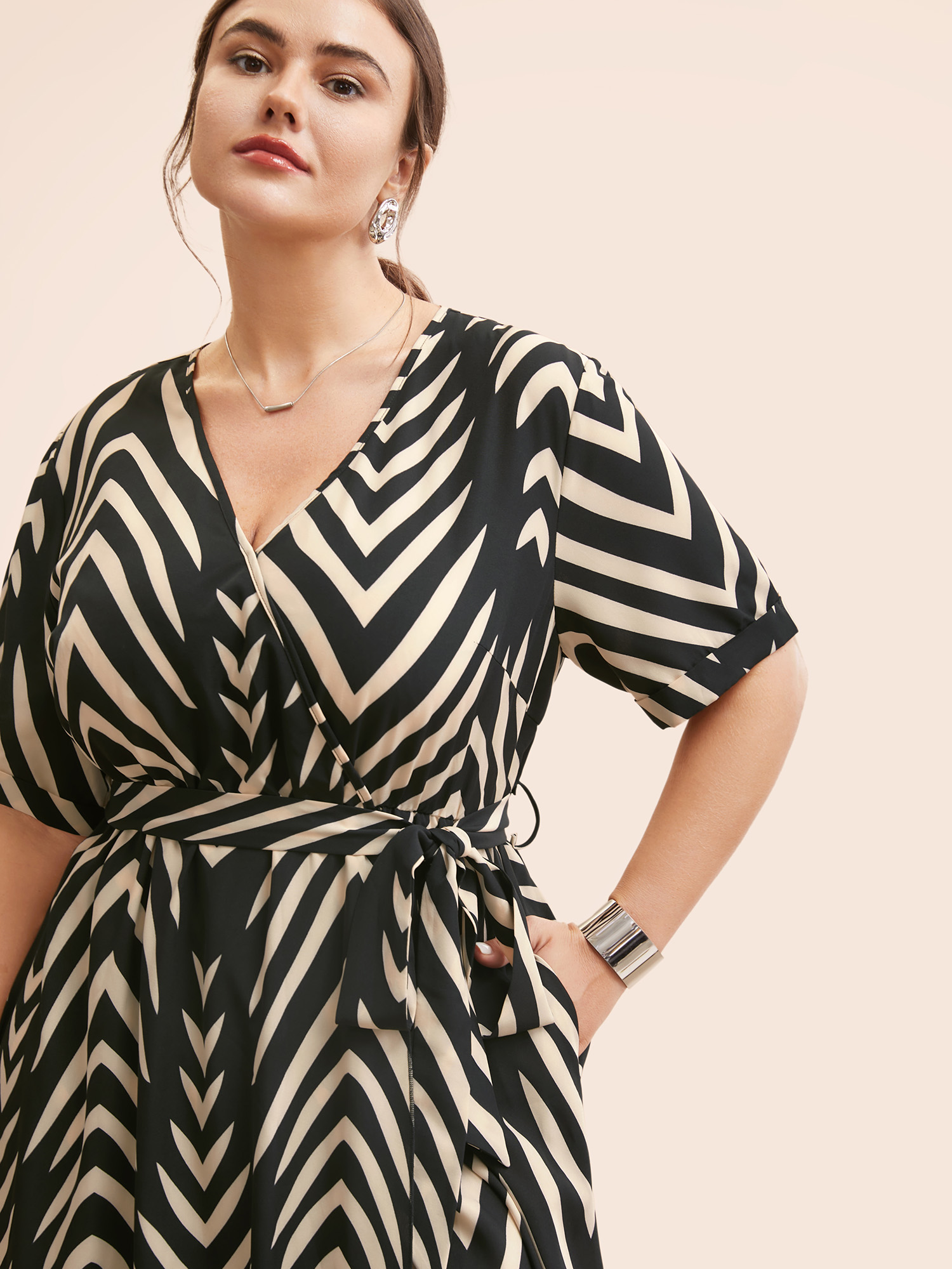 

Plus Size Geometric Striped Overlap Collar Midi Dress Black Women At the Office Belted Overlap Collar Half Sleeve Curvy BloomChic