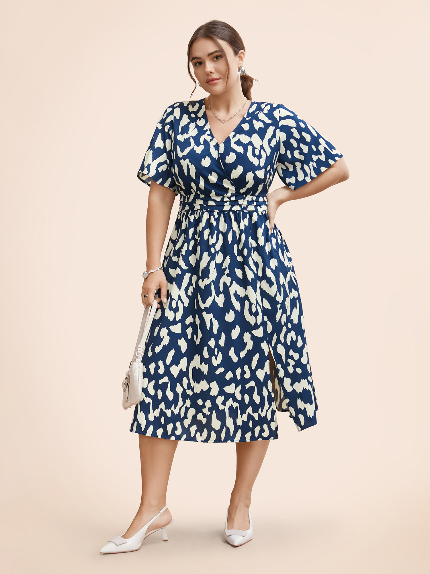 

Plus Size Leopard Print Shirred Split Hem Dress Indigo Women At the Office Tucked seam Overlap Collar Short sleeve Curvy BloomChic