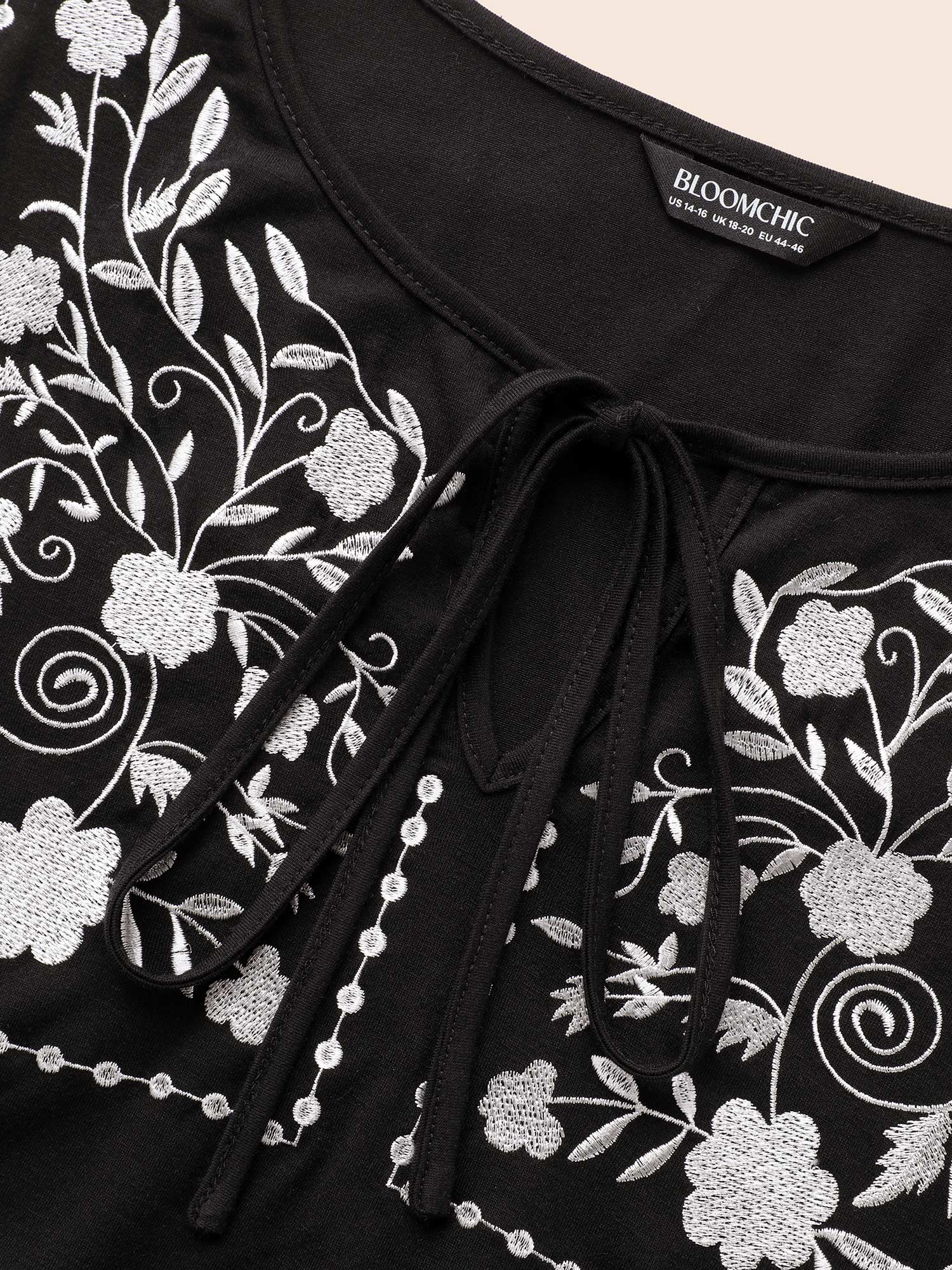 Plus Size Floral Embroidered Knot Neck Lantern Sleeve T-shirt Black Women Elegant Elastic cuffs Silhouette Floral Print Tie Neck Dailywear T-shirts BloomChic 30/6X 