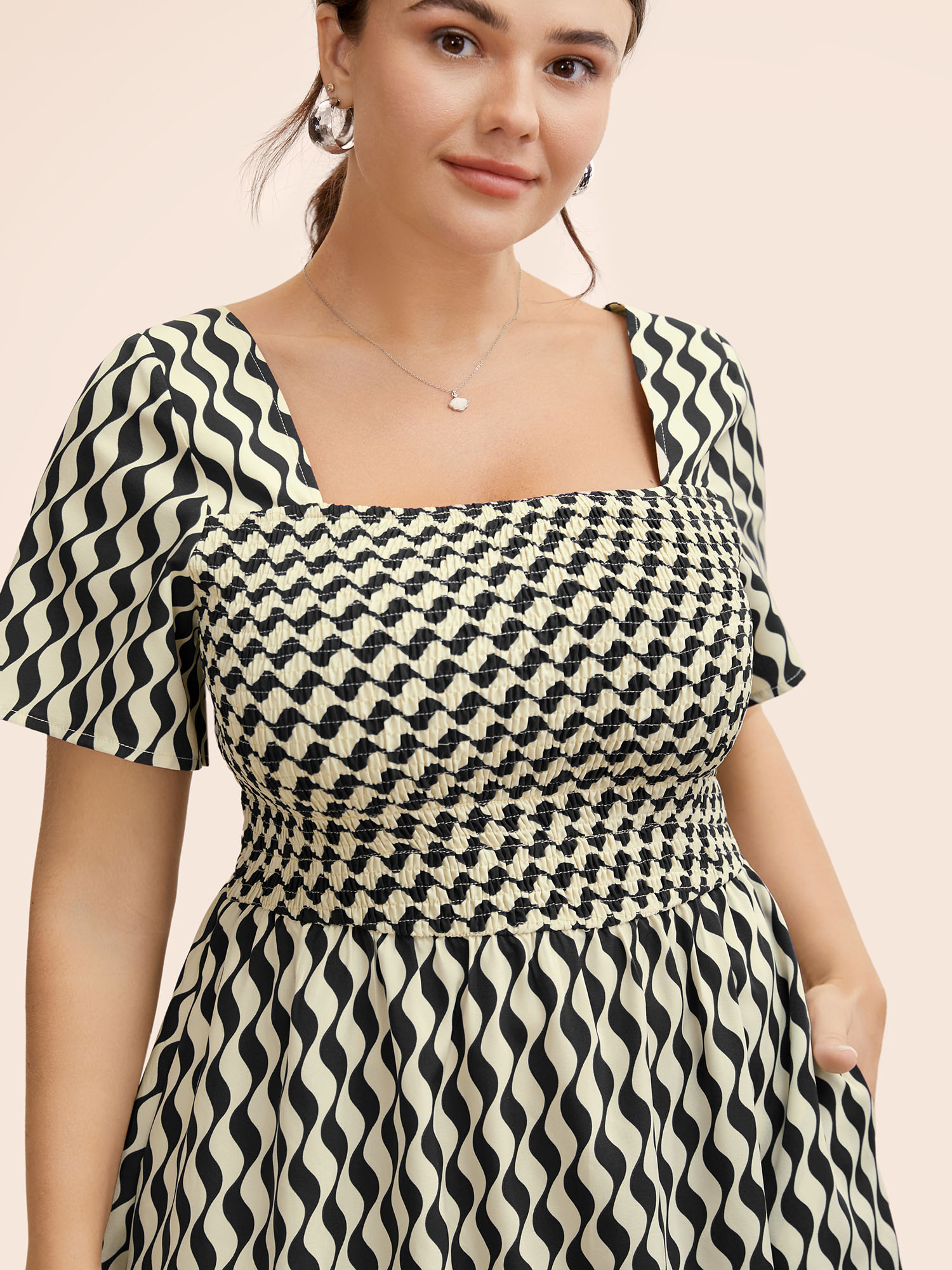 

Plus Size Geometric Print Shirred Ruffle Hem Dress Black Women Workwear Essentials Shirred Square Neck Short sleeve Curvy BloomChic