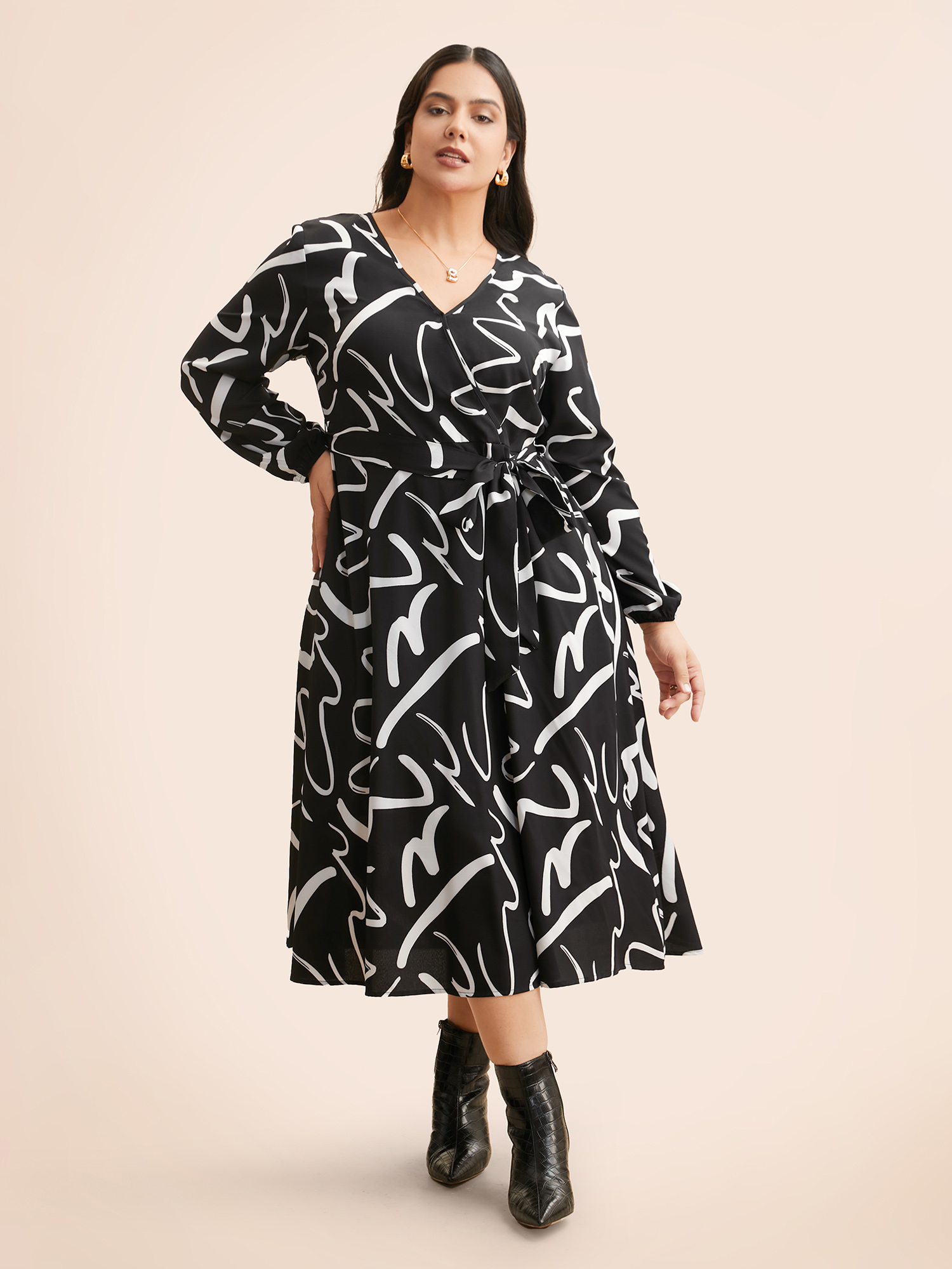 

Plus Size Geometric Overlap Collar Midi Dress BlackFlower Women At the Office Belted Overlap Collar Long Sleeve Curvy BloomChic