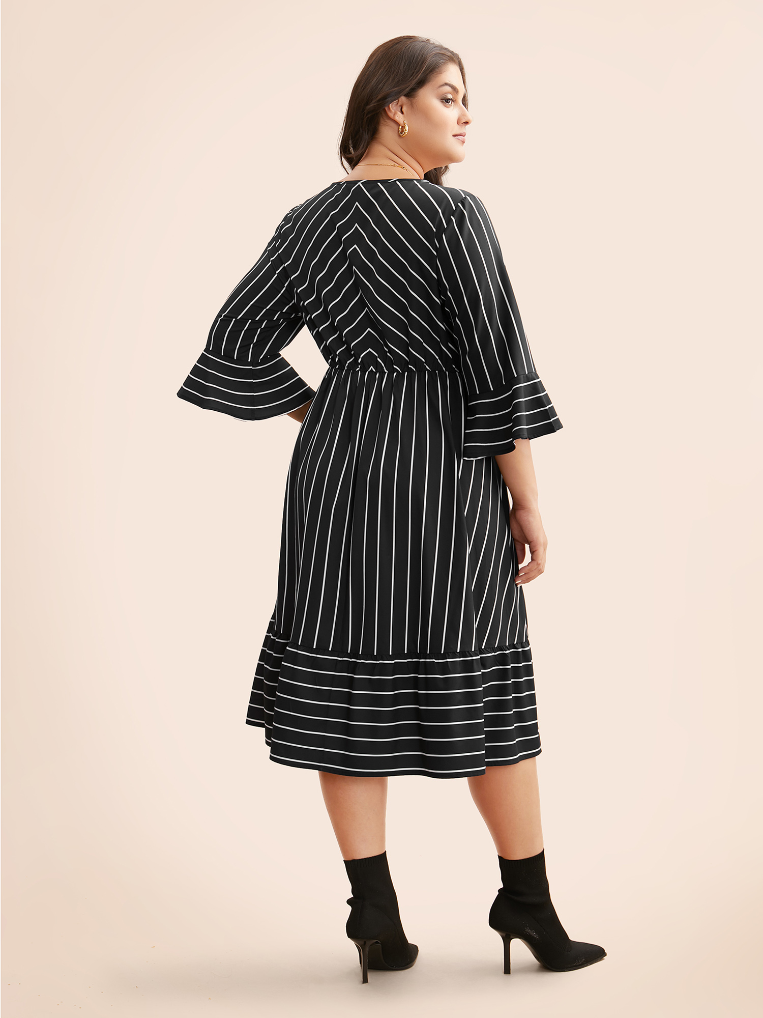 

Plus Size Striped Flutter Sleeve Midi Dress Black Women At the Office Ruffles Round Neck Elbow-length sleeve Curvy BloomChic