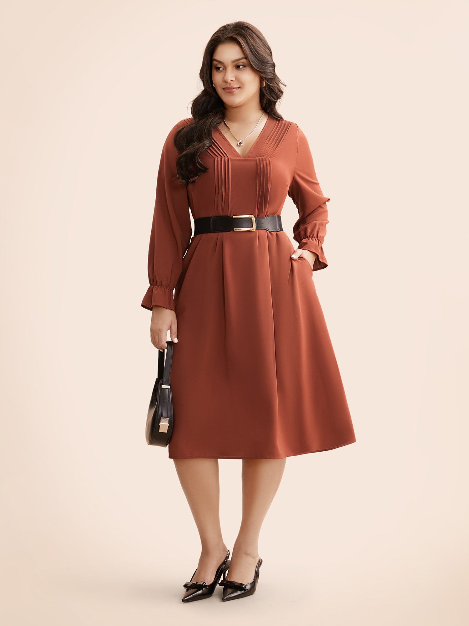 

Plus Size V Neck Pleated Lantern Sleeve Dress Rust Women At the Office Tucked seam V-neck Long Sleeve Curvy BloomChic