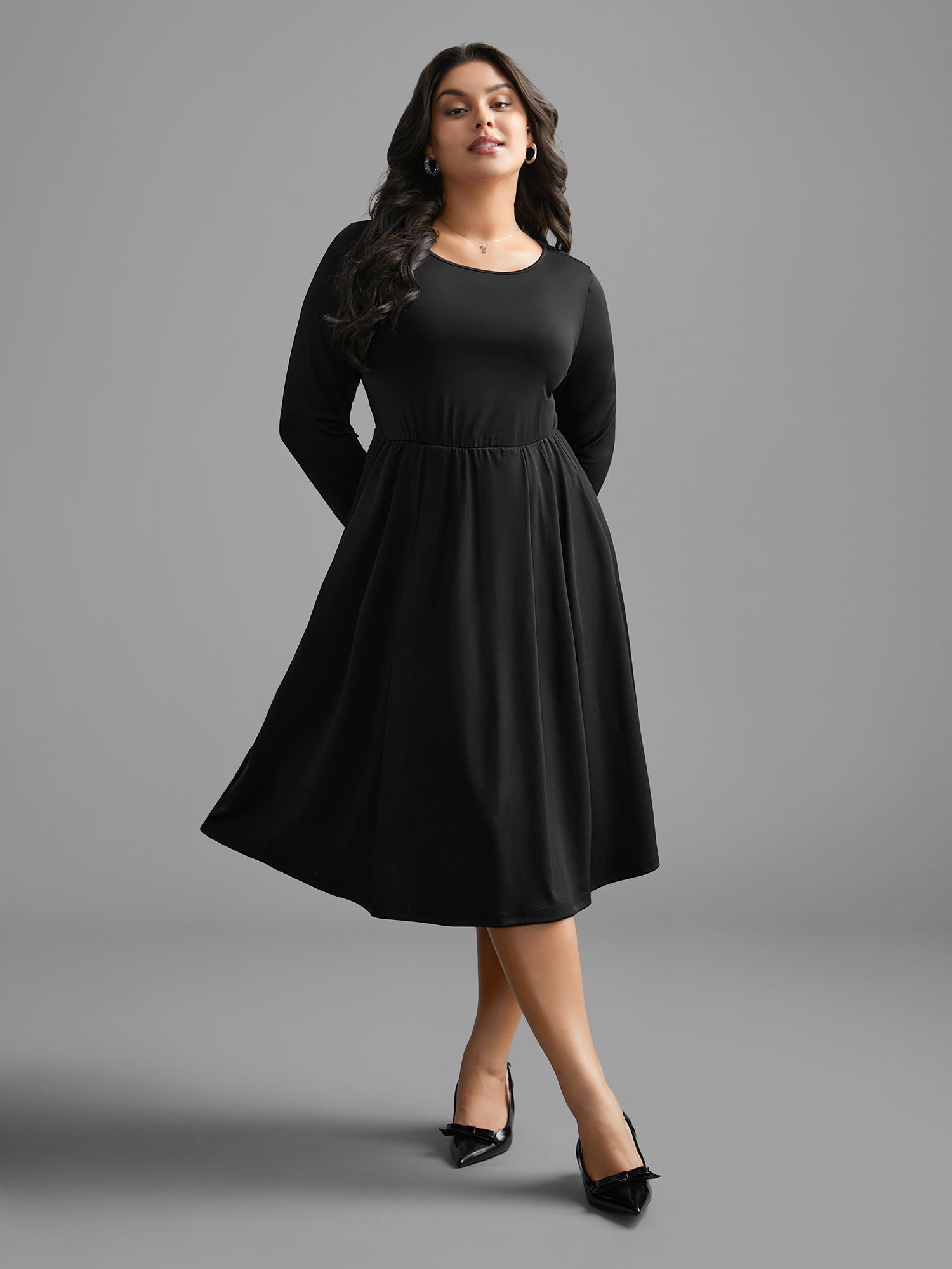 

Plus Size Round Neck Elastic Waist Pleated Dress Black Women At the Office Pleated Round Neck Long Sleeve Curvy BloomChic