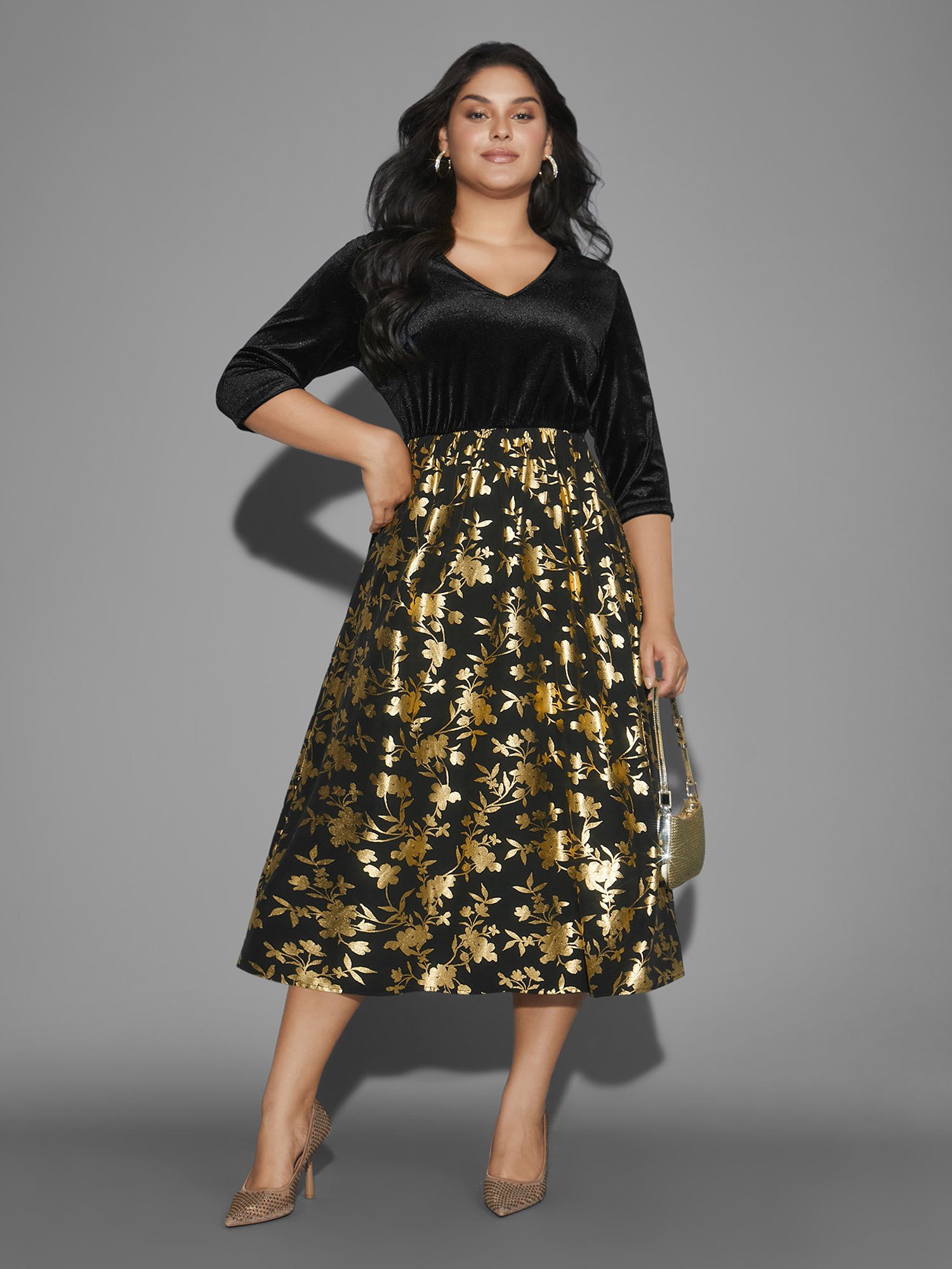 Side view of BloomChic Women's Plus Size Glitter Floral Patchwork Velvet Midi Dress Black Party 22-24/3X