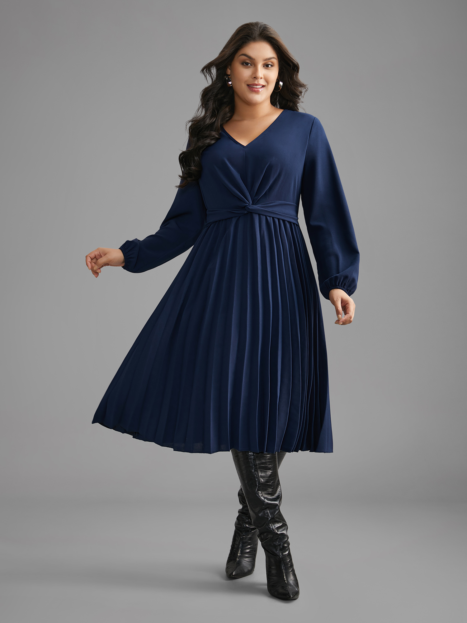 

Plus Size V Neck Twist Front Pleated Dress Indigo Women At the Office Twist V-neck Long Sleeve Curvy BloomChic