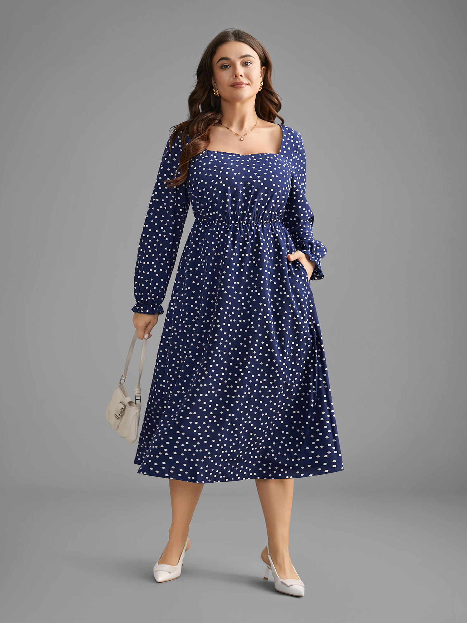 

Plus Size Polka Dot Heart Neckline Midi Dress Indigo Women At the Office Ruffles Heart neckline Long Sleeve Curvy BloomChic