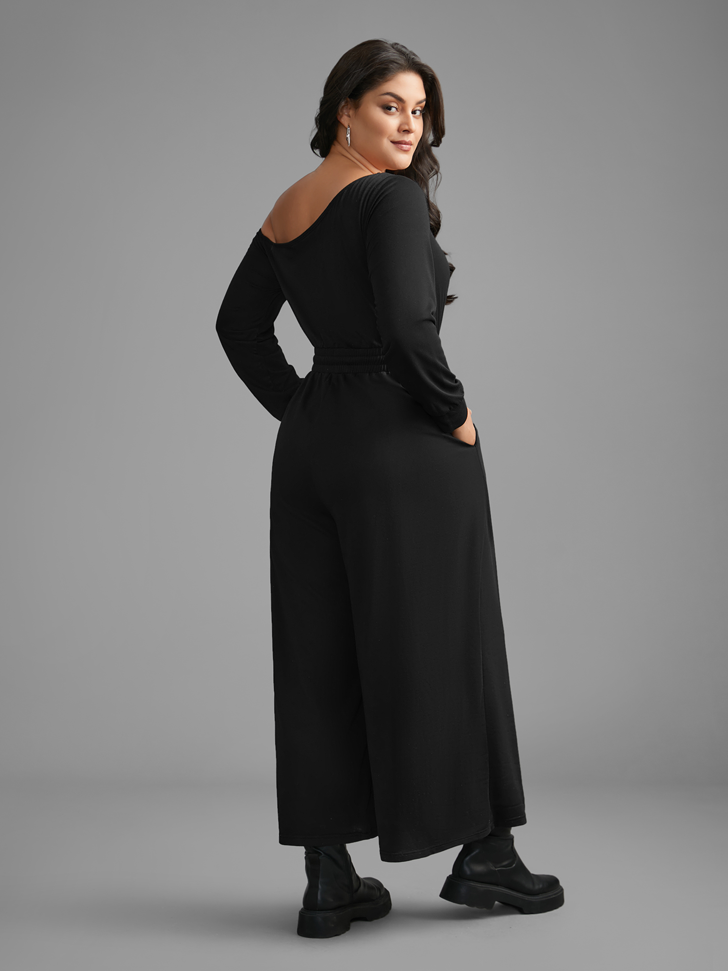 

Plus Size Black Textured Sheer Hollow Sleeves Jumpsuit Women Casual Long Sleeve Asymmetrical Neck Everyday Loose Jumpsuits BloomChic