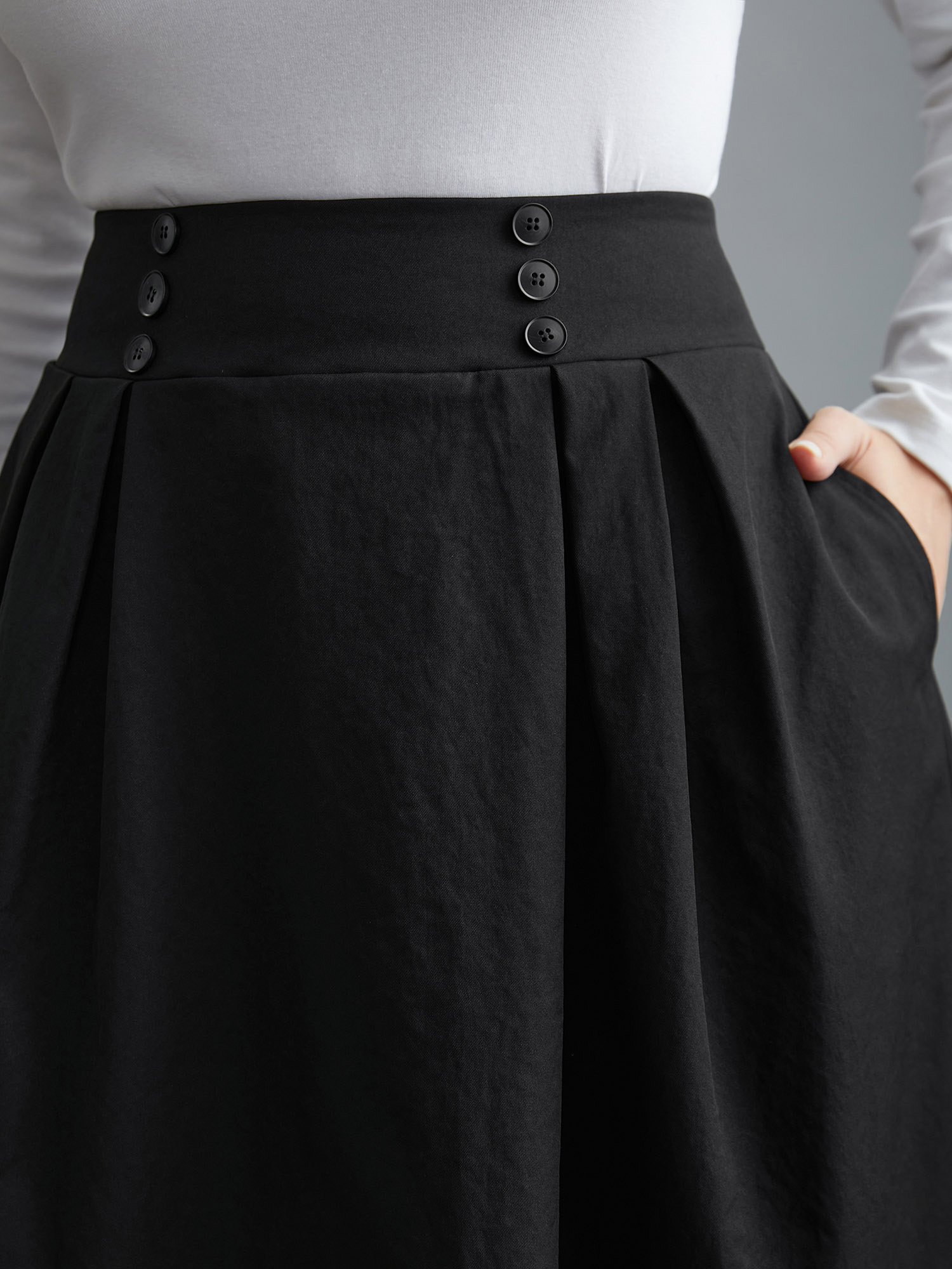 

Plus Size Elastic Waist Fastener Pleated Skirt Women Black Elegant Button Low stretch Slanted pocket Everyday Skirts BloomChic