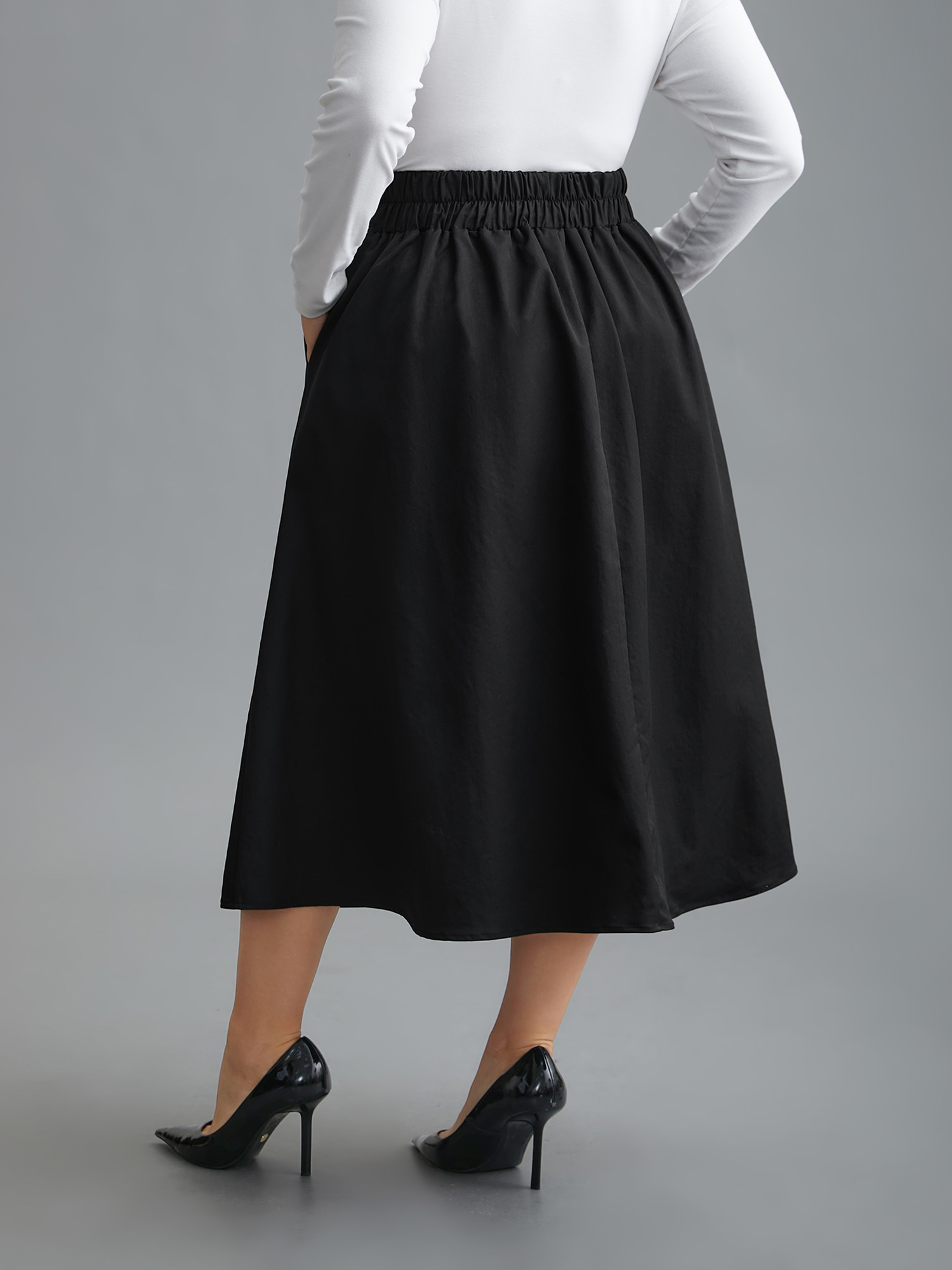 Plus Size Elastic Waist Fastener Pleated Skirt Women Black Elegant Button Low stretch Slanted pocket Everyday Skirts BloomChic 18-20/2X 