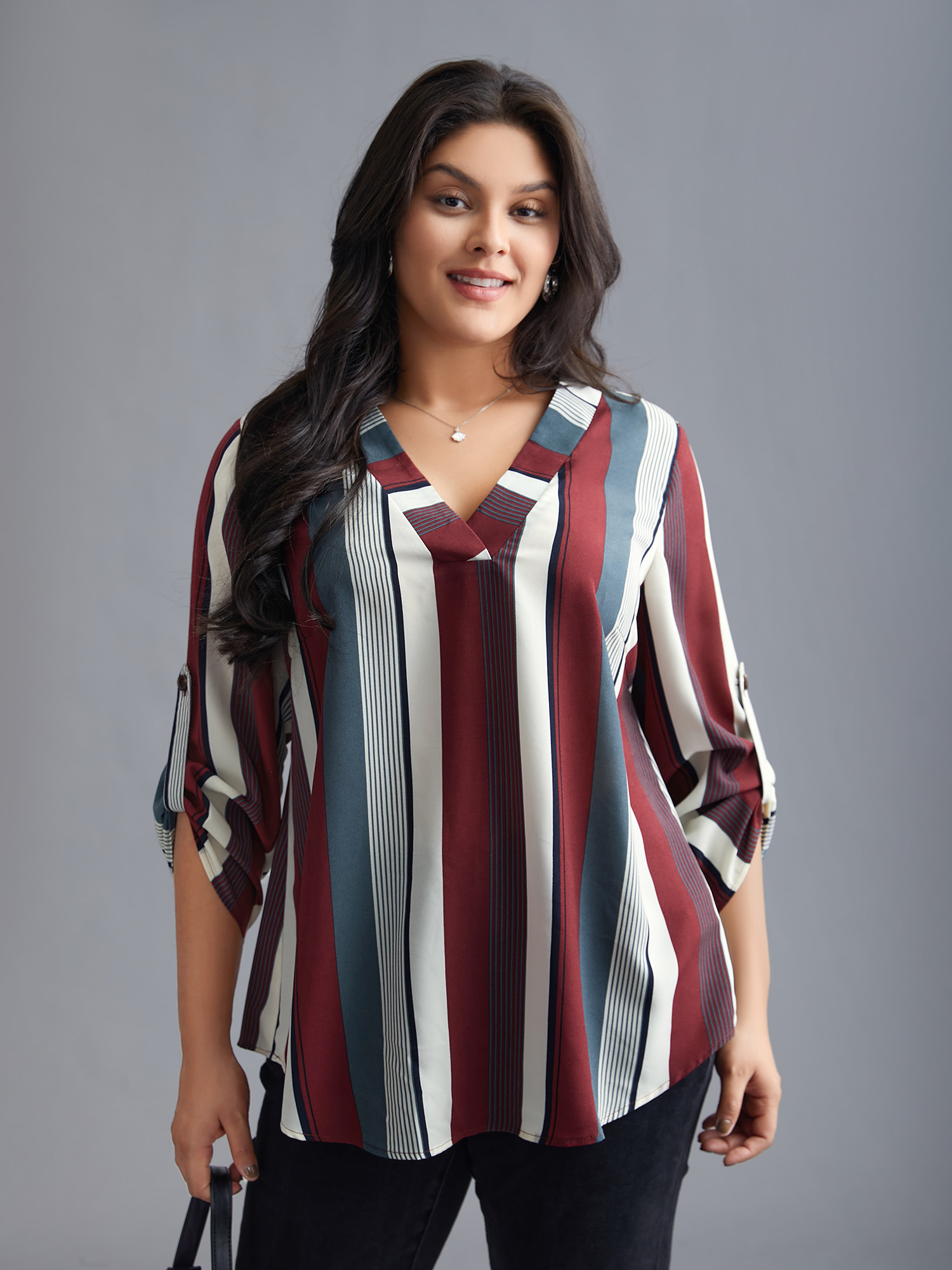 

Plus Size Multicolor Vertical Striped V-Neck Tab Sleeve Blouse Women At the Office Elbow-length sleeve V-neck Work Blouses BloomChic