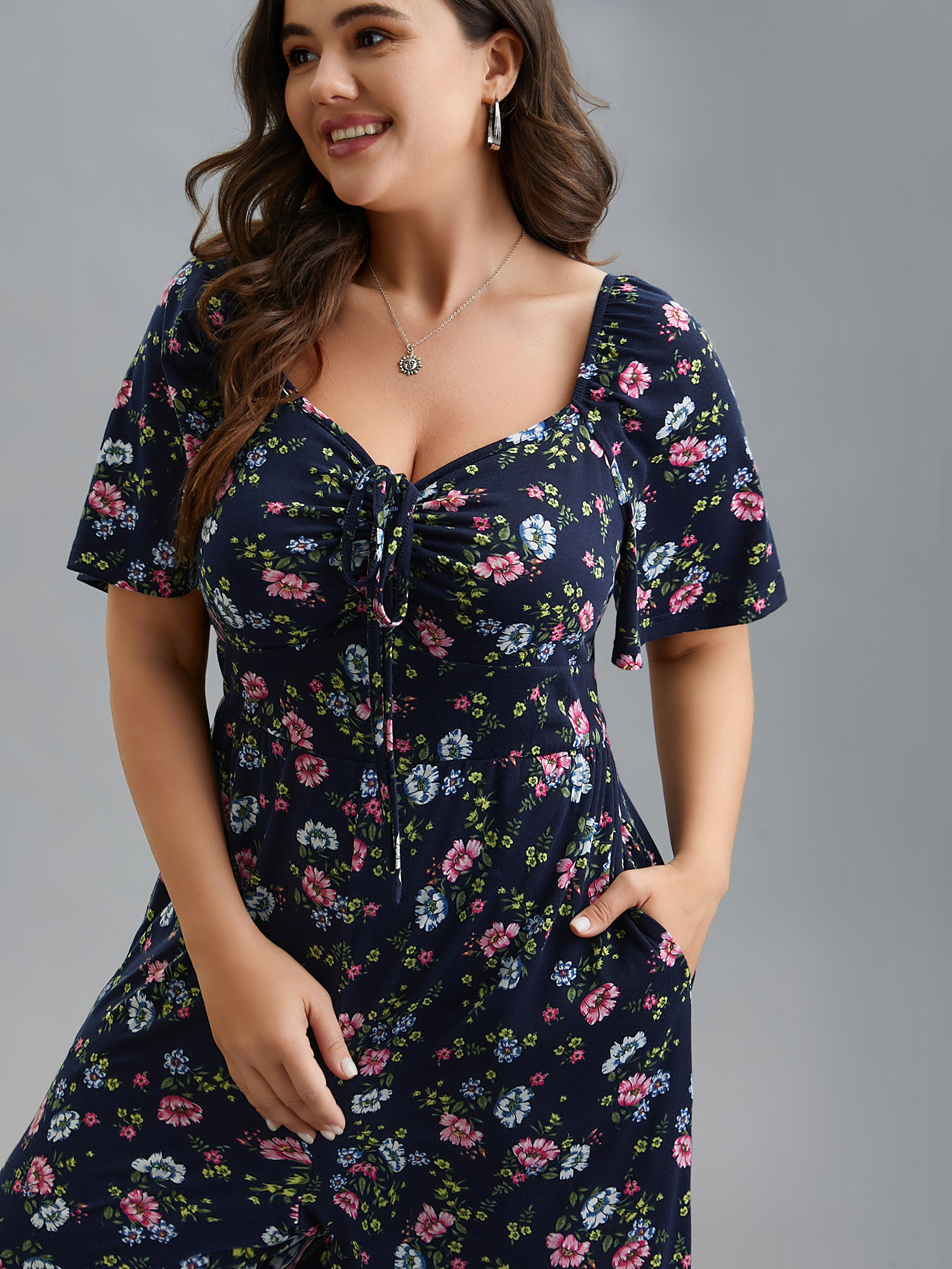 

Plus Size DarkBlue Supersoft Floral Neck Drawstring Flared Jumpsuit Women Casual Short sleeve Heart neckline Everyday Loose Jumpsuits BloomChic 16/L