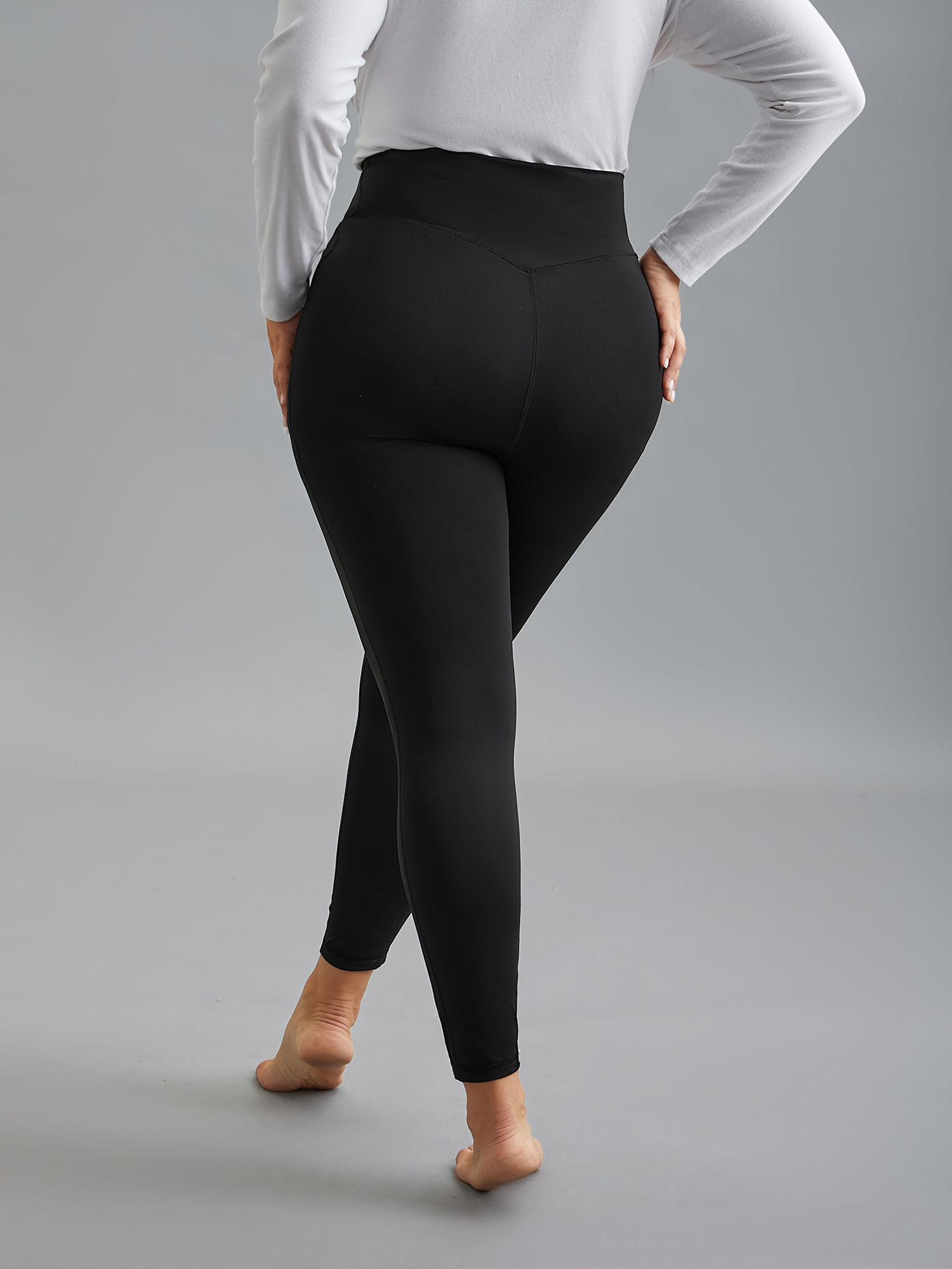 

Plus Size Criss-Cross Waist Pocket Tight Pants Women Black Elegant Medium stretch Skinny Mid Rise Everyday Leggings BloomChic