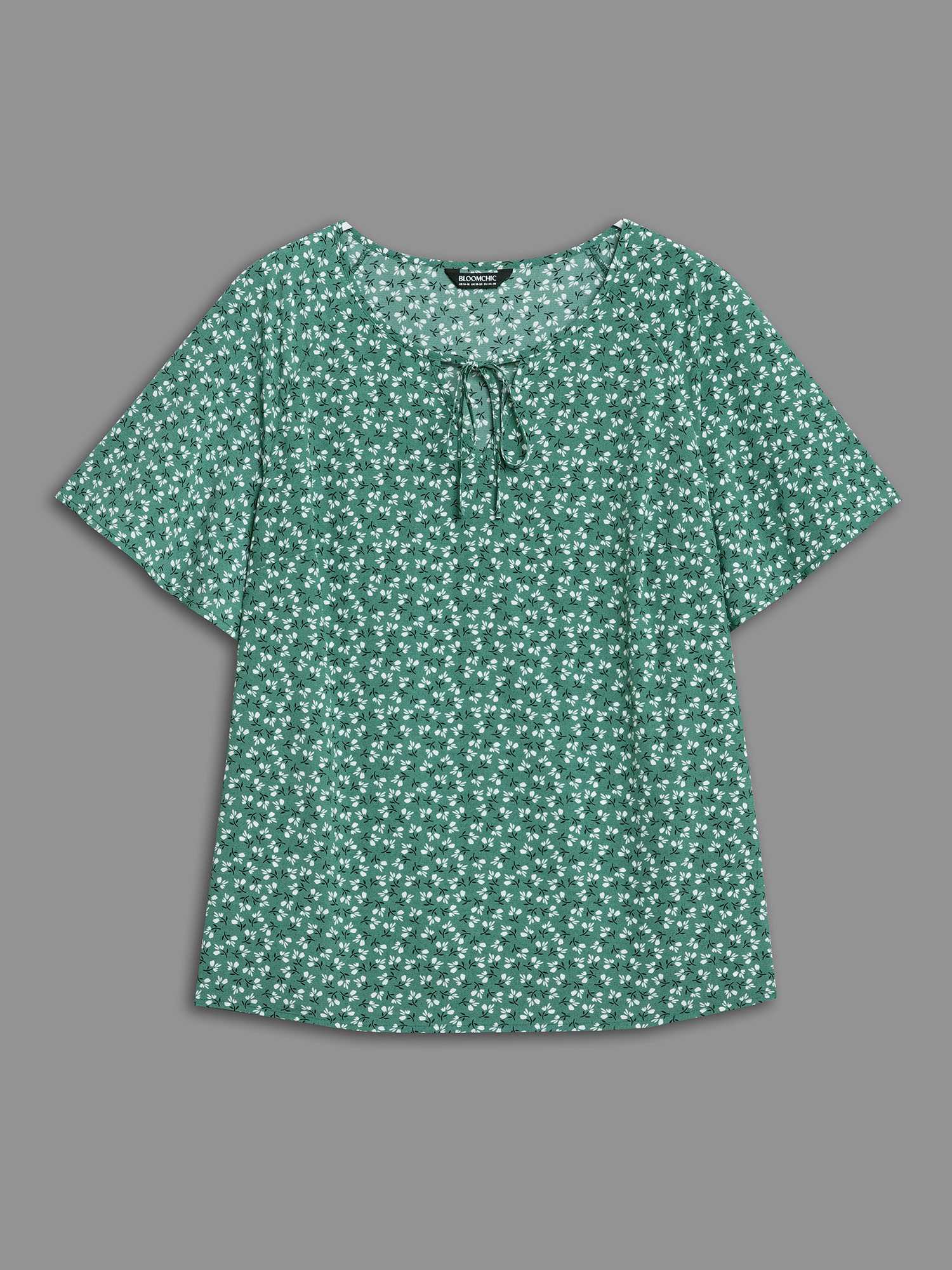 

Plus Size Emerald Ditsy Floral Print Half Sleeve Shirt Women Elegant Short sleeve Ribbon-tied collar Everyday Blouses BloomChic