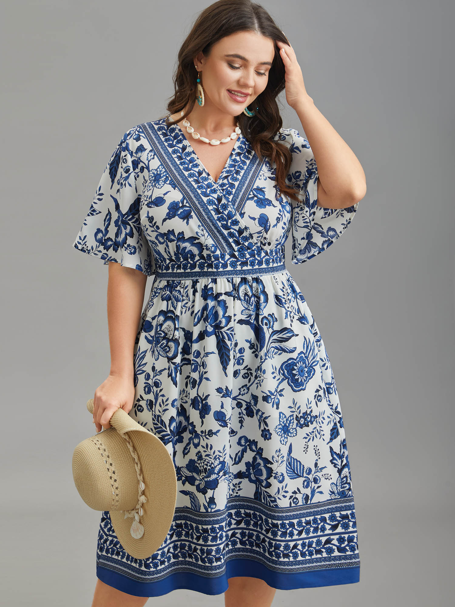 

Plus Size Floral Print Wrap-Neck Pocket Midi Dress Navy Women Resort Non Overlap Collar Short sleeve Curvy BloomChic