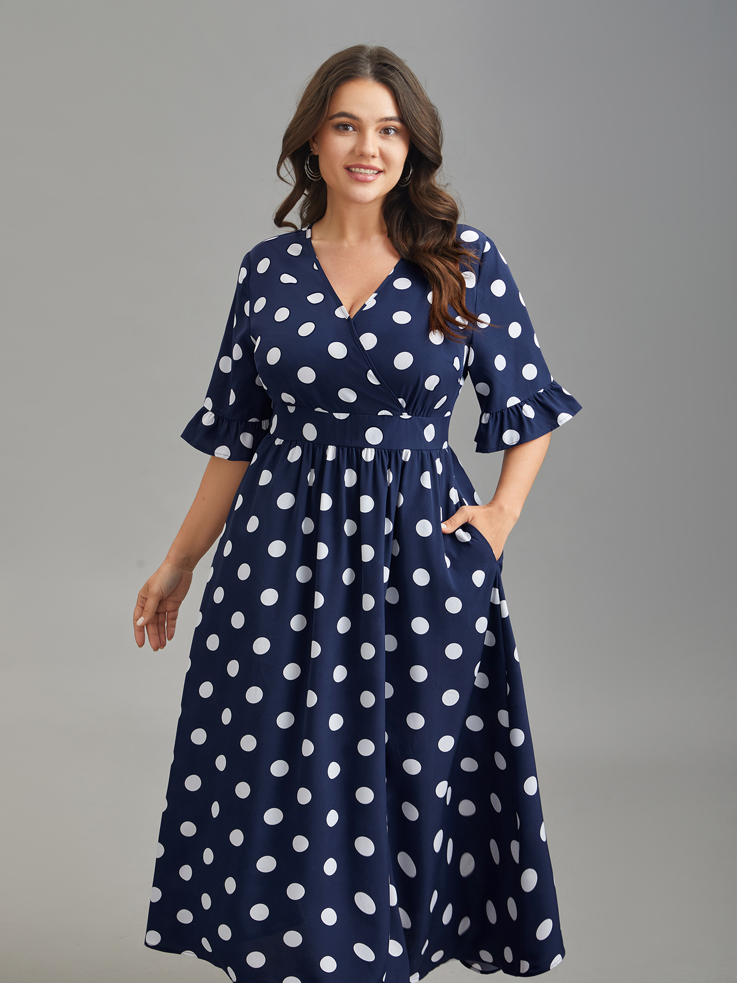 

Plus Size Polka Dots Surplice Neck Waist-Cinched Dress Navy Women Elegant Ruffles Overlap Collar Elbow-length sleeve Curvy BloomChic