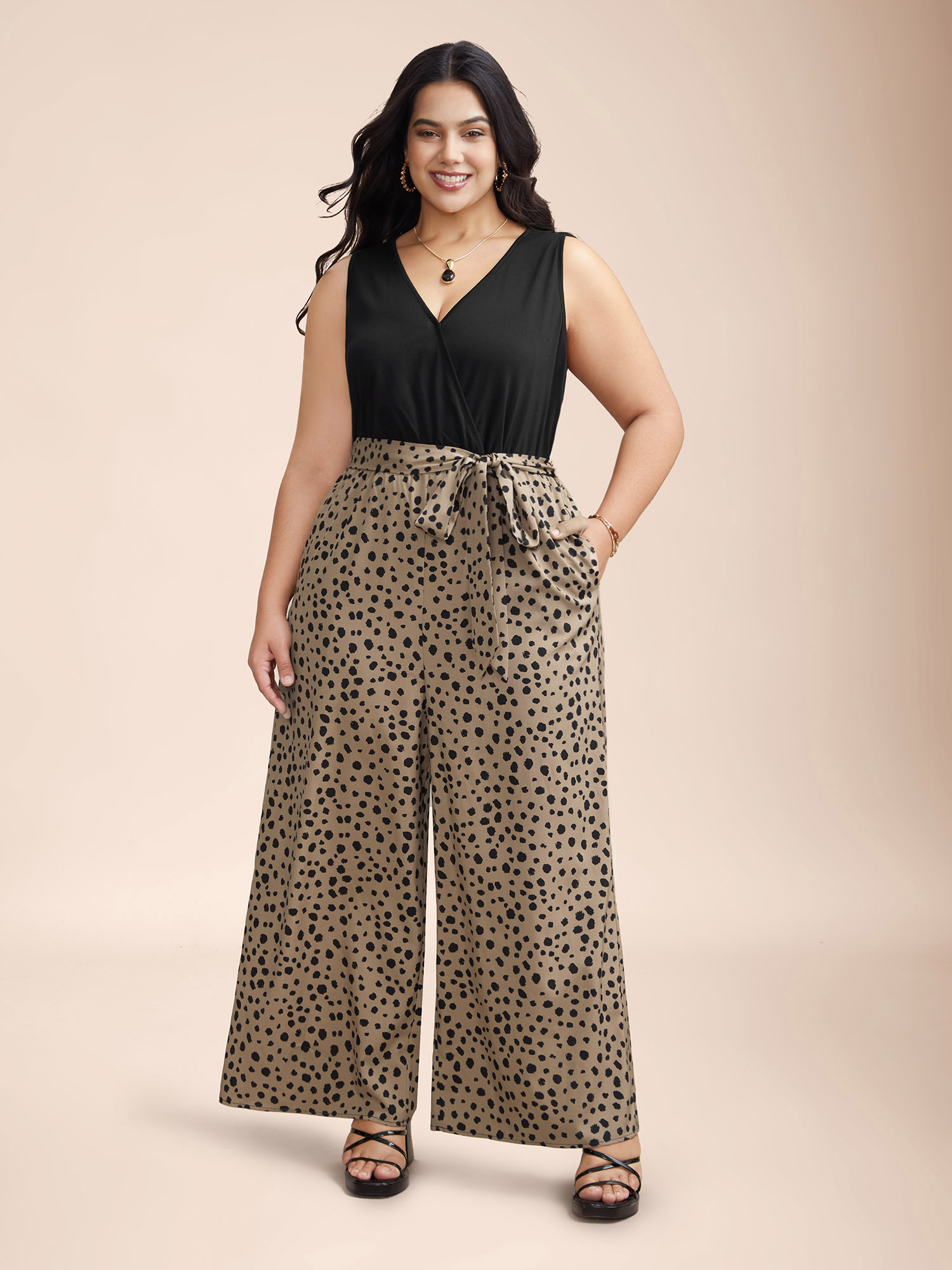 

Plus Size LightBrown Spliced Belted Pockets Contrast Jumpsuit Women Elegant Sleeveless Overlap Collar Everyday Loose Jumpsuits BloomChic