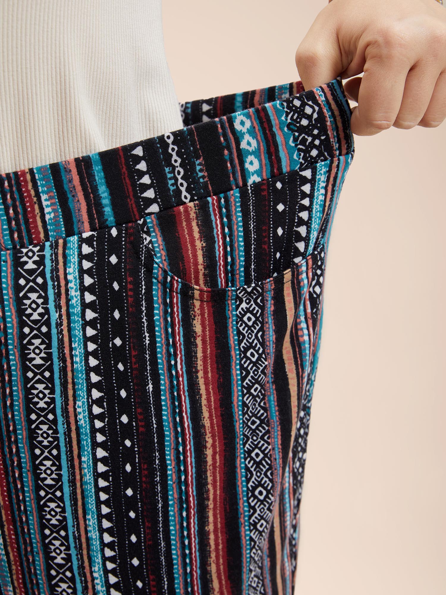 Plus Size Floral Pattern Midi-Rise Bootcut Legging Women Multicolor Resort Medium stretch Bootcut Mid Rise Vacation Leggings BloomChic 18-20/2X 