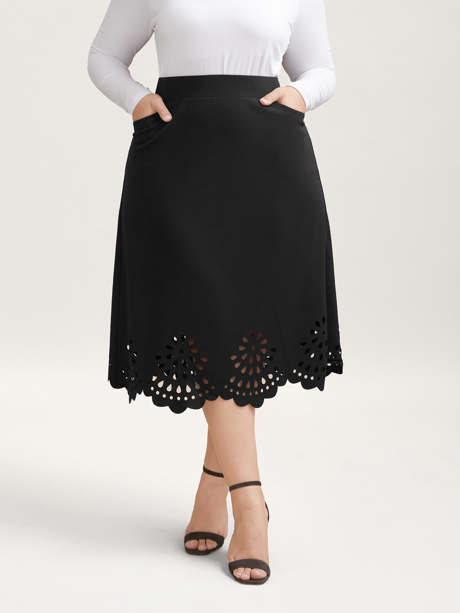 

Plus Size Laser Cut-Out Flared Midi Skirt Women Black Elegant Cut-Out Medium stretch Slanted pocket Everyday Skirts BloomChic