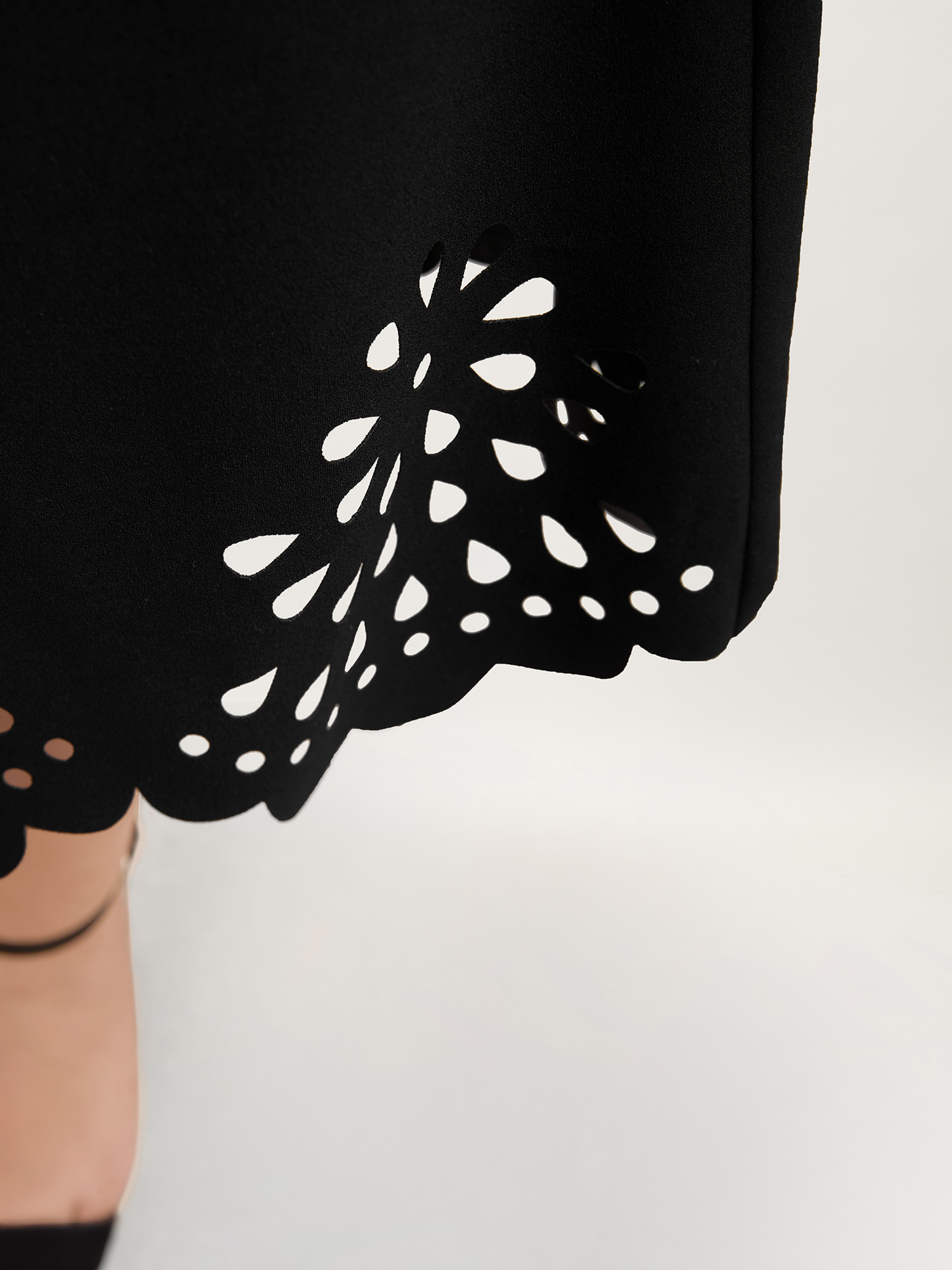 Plus Size Laser Cut-Out Flared Midi Skirt Women Black Elegant Cut-Out Medium stretch Slanted pocket Everyday Skirts BloomChic 22-24/3X 