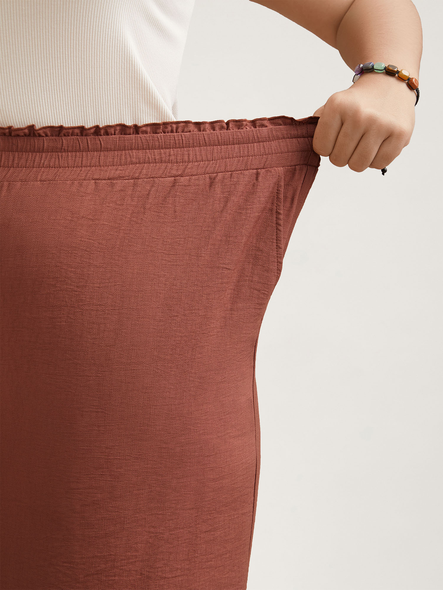 Plus Size Smocked Stretchy Waist Ruffled Wide Leg Pants Women Maroon Resort Wide Leg Mid Rise Vacation Pants BloomChic 14-16/1X 