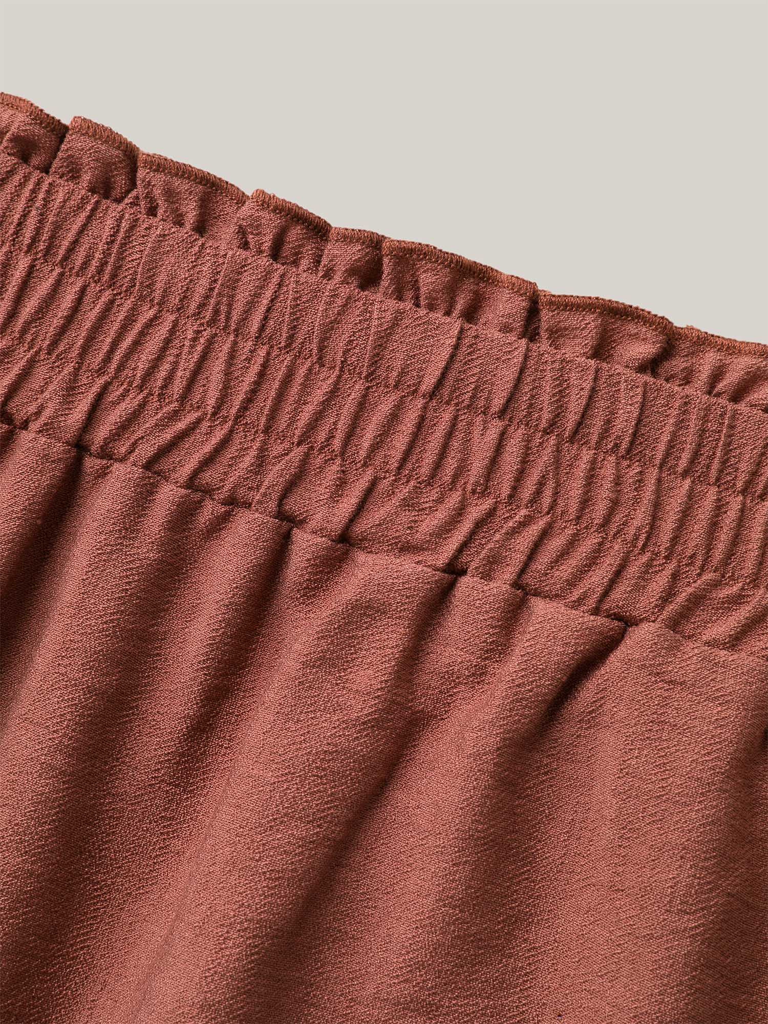 Plus Size Smocked Stretchy Waist Ruffled Wide Leg Pants Women Maroon Resort Wide Leg Mid Rise Vacation Pants BloomChic 14-16/1X 
