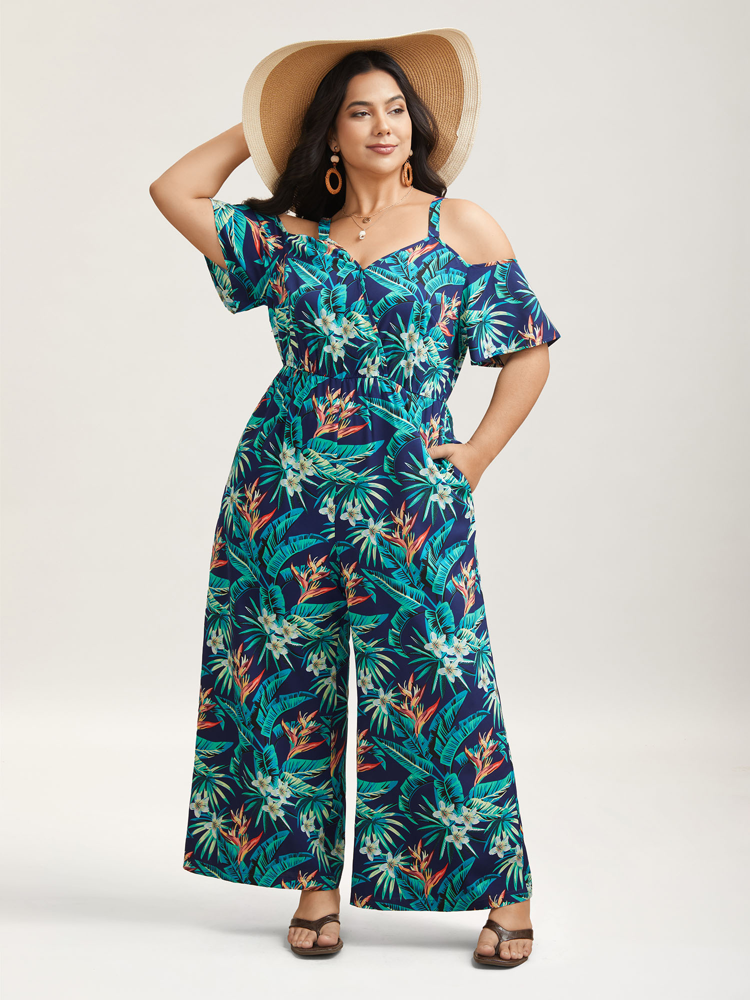 

Plus Size Indigo Tropical Print Cold-Shoulder Belted Jumpsuit Women Resort Short sleeve One-shoulder neck Vacation Loose Jumpsuits BloomChic