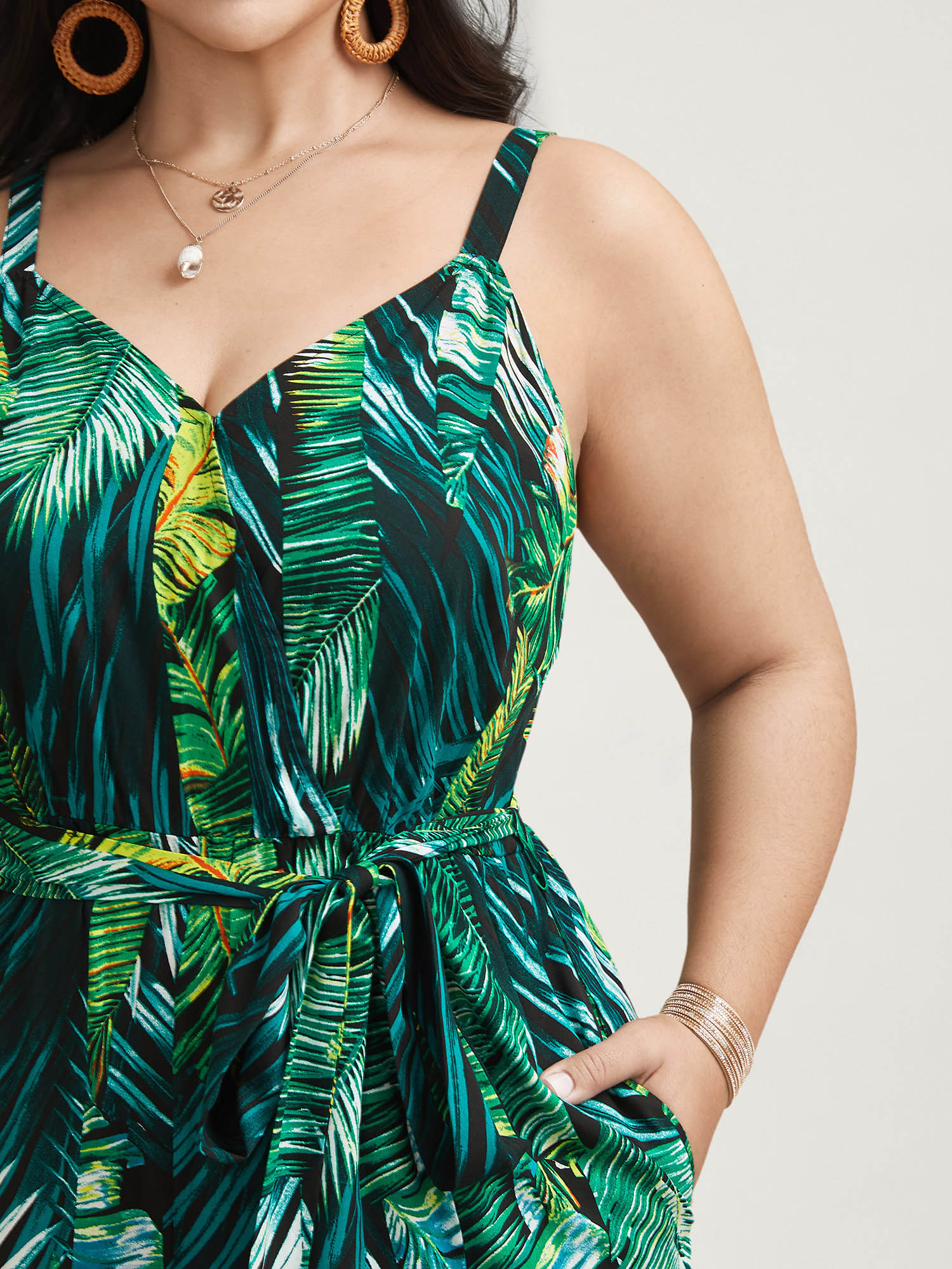 Plus Size BlackFlower Tropical Leaf Print Stretchy Belted Slit Jumpsuit Women Resort Sleeveless Overlap Collar Vacation Loose Jumpsuits BloomChic 28/5X 